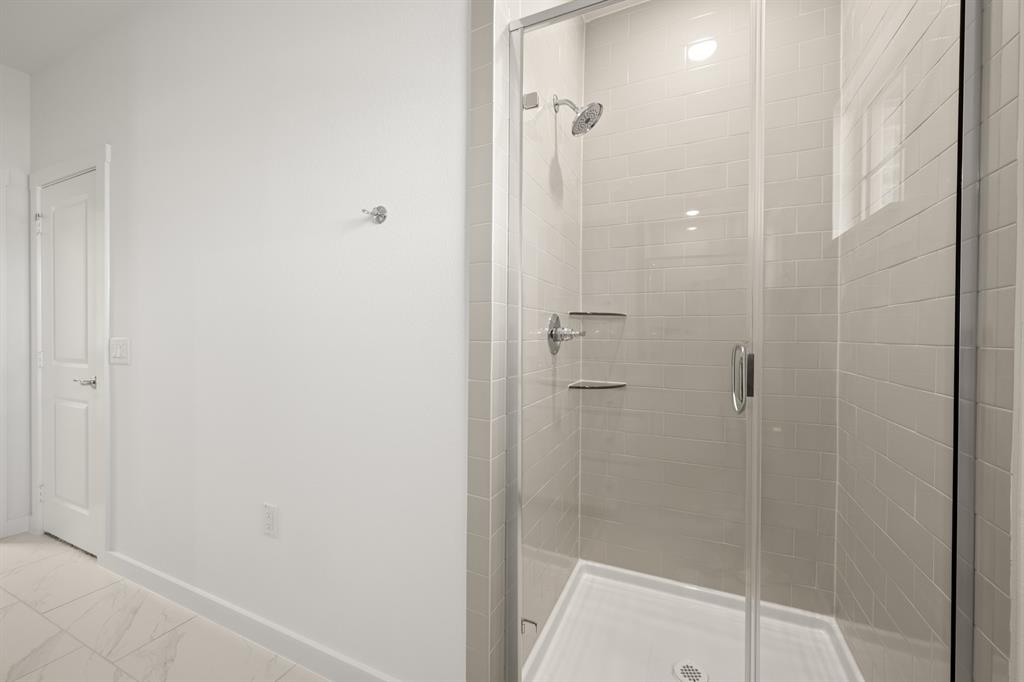 4619 Hawks Trail Oak Point, TX 75068 - Photo 30 of 40 a bathroom with a shower