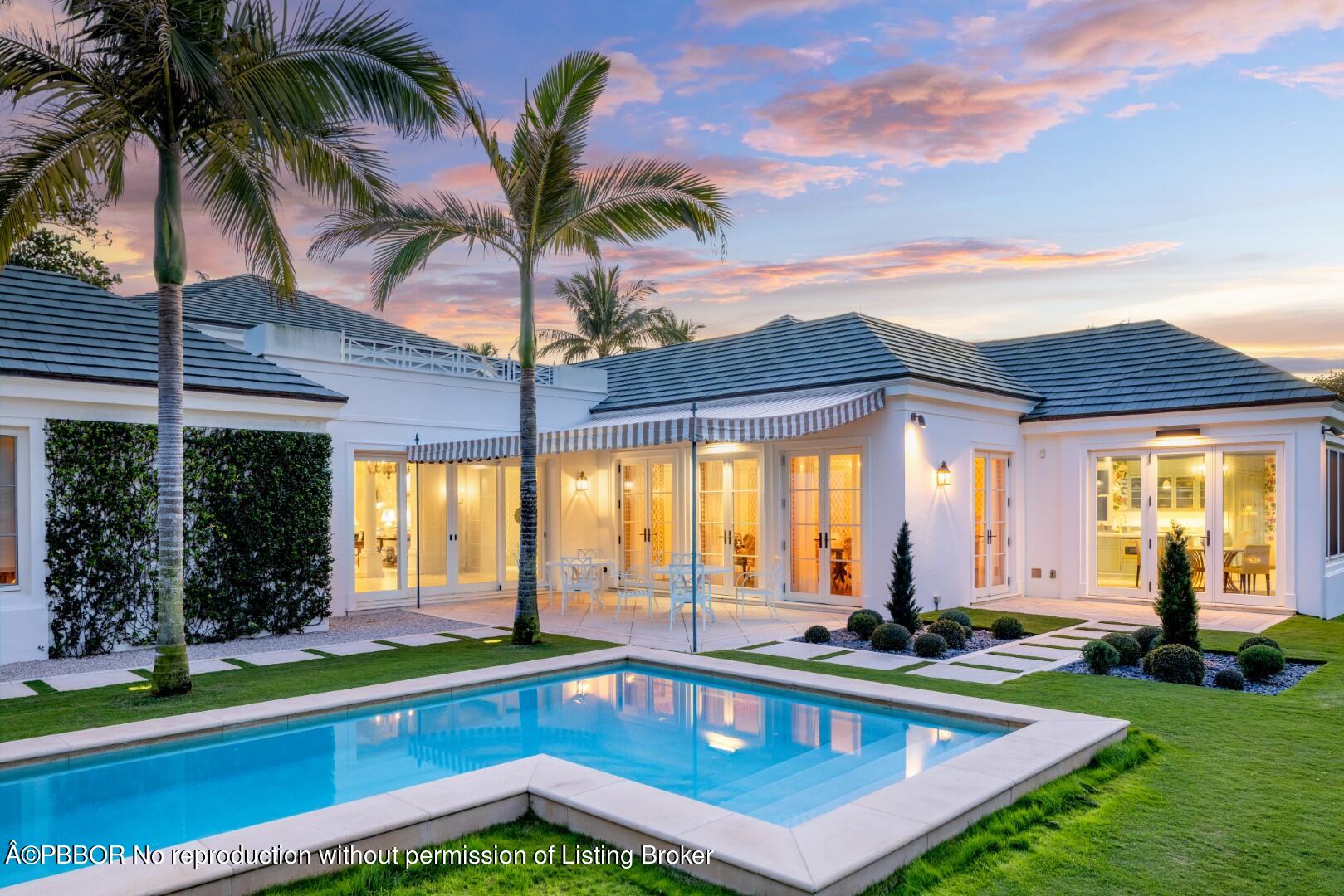 710 South County Road Palm Beach, FL 33480 - Photo 10 of 69 a view of a house with swimming pool and a porch