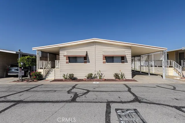 a front view of a house with patio