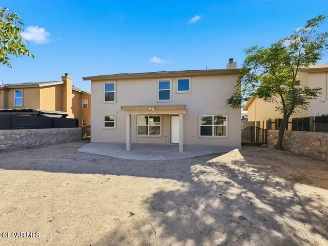 a view of a house with a patio