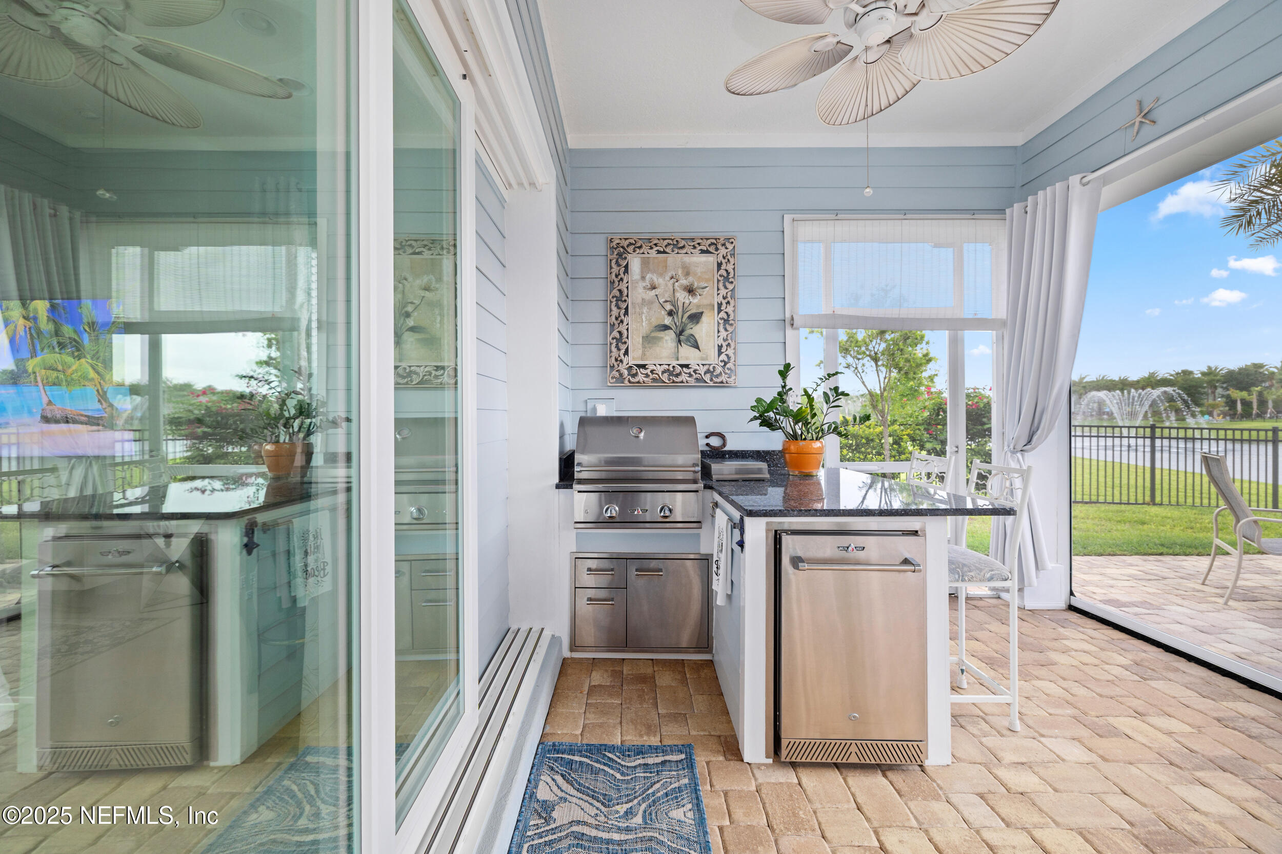 651 Rum Runner Way St. Johns, FL 32259 - Photo 16 of 97 a kitchen with stainless steel appliances granite countertop a stove and a refrigerator