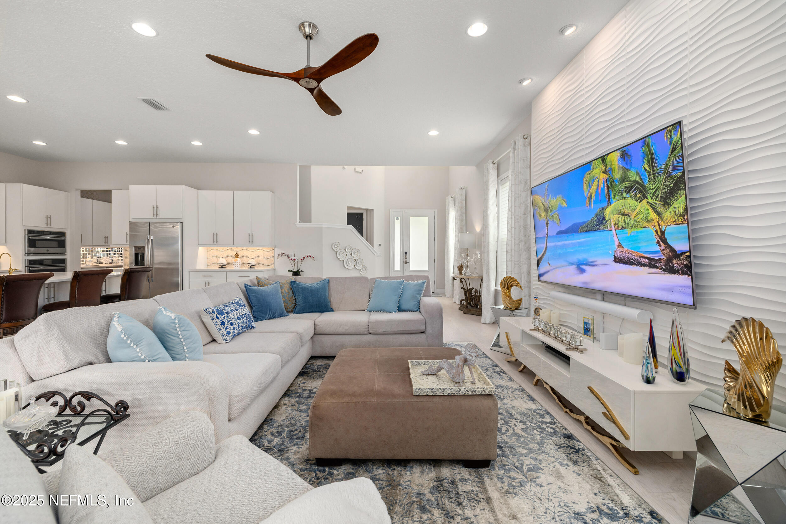 651 Rum Runner Way St. Johns, FL 32259 - Photo 23 of 97 a living room with furniture and kitchen view