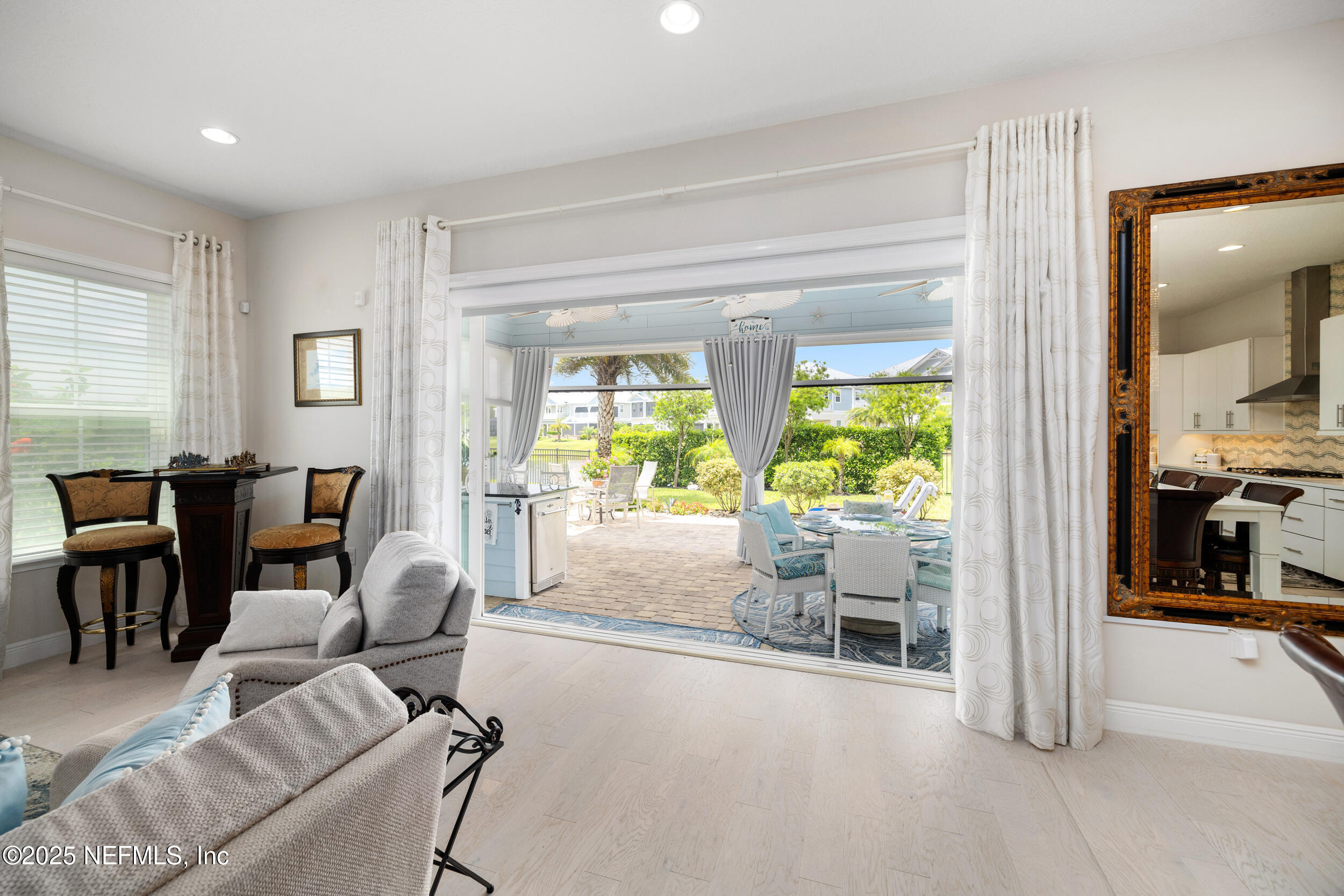 651 Rum Runner Way St. Johns, FL 32259 - Photo 26 of 97 a living room with furniture and a large window