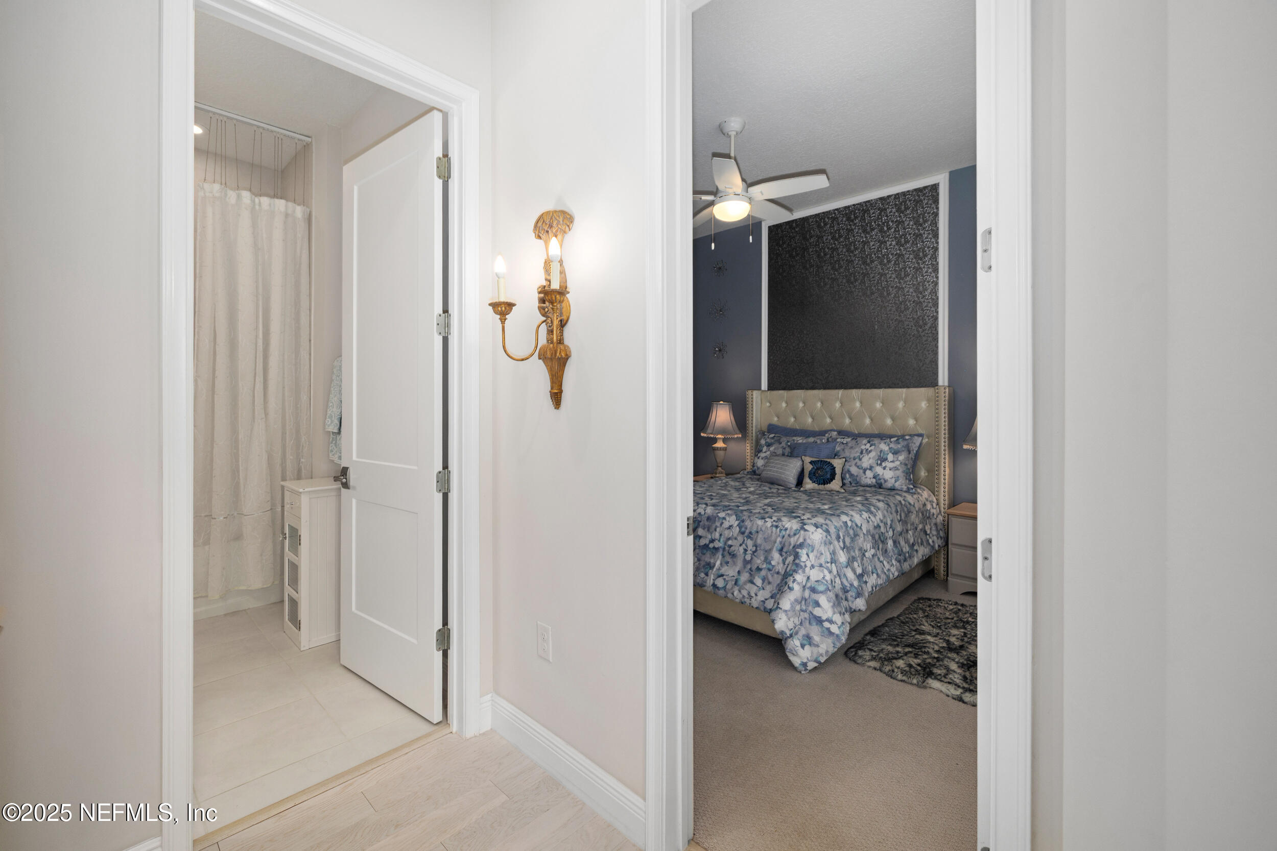 651 Rum Runner Way St. Johns, FL 32259 - Photo 38 of 97 a bathroom with a sink and mirror