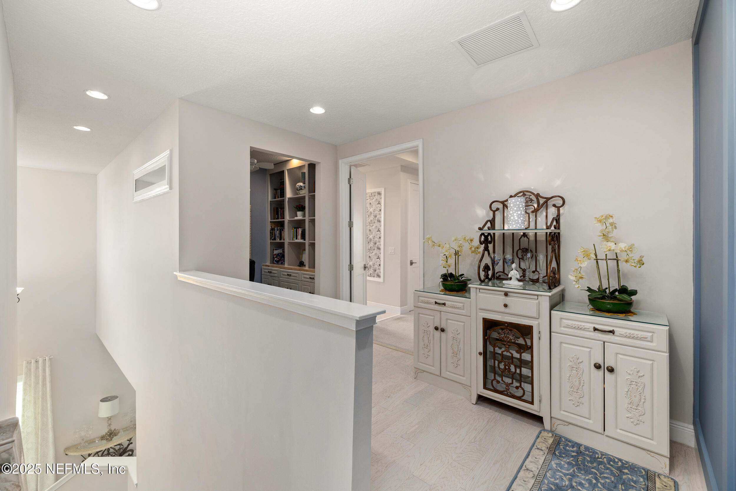 651 Rum Runner Way St. Johns, FL 32259 - Photo 45 of 97 a kitchen with white cabinets and sink