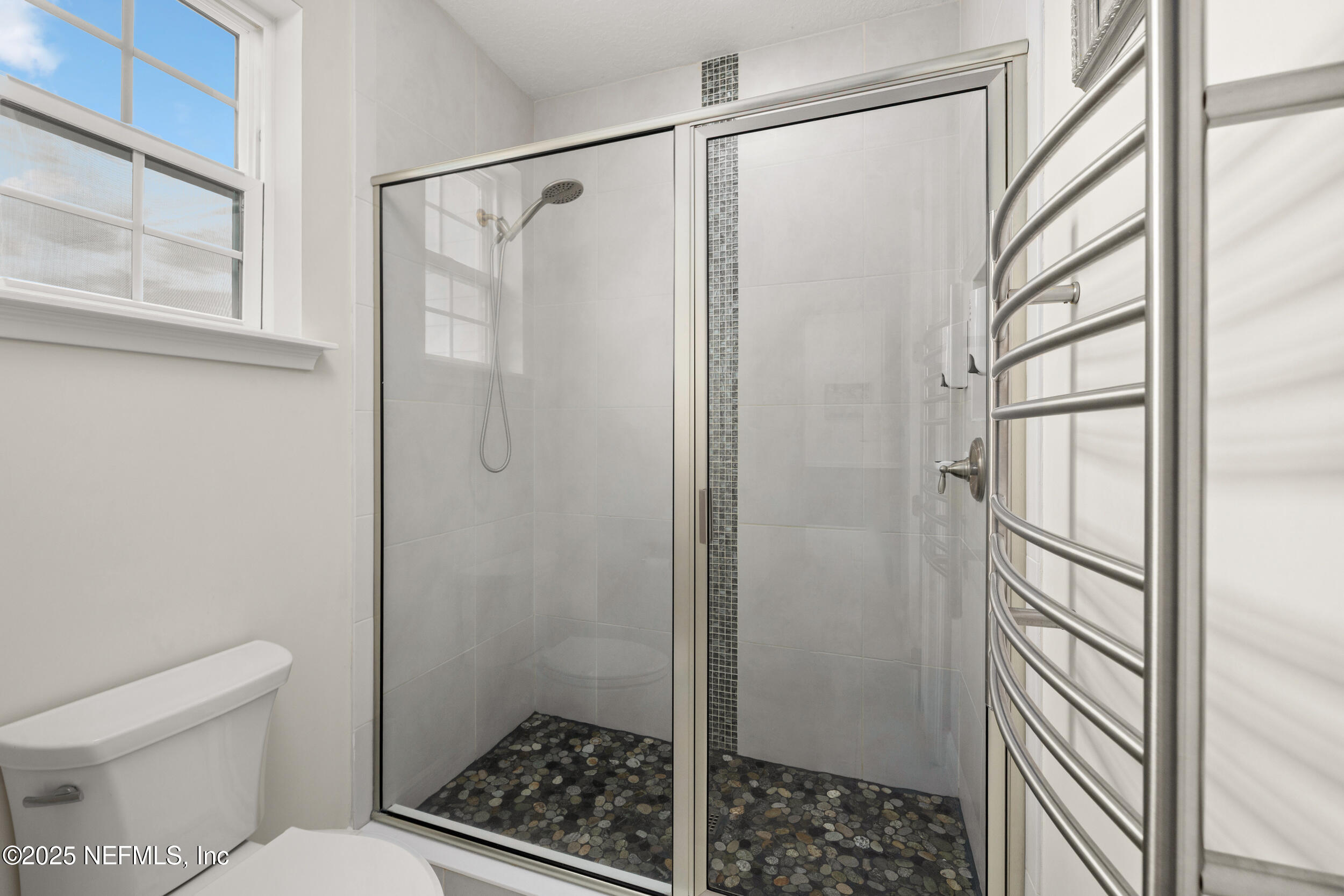 651 Rum Runner Way St. Johns, FL 32259 - Photo 63 of 97 a bathroom with a shower toilet and sink