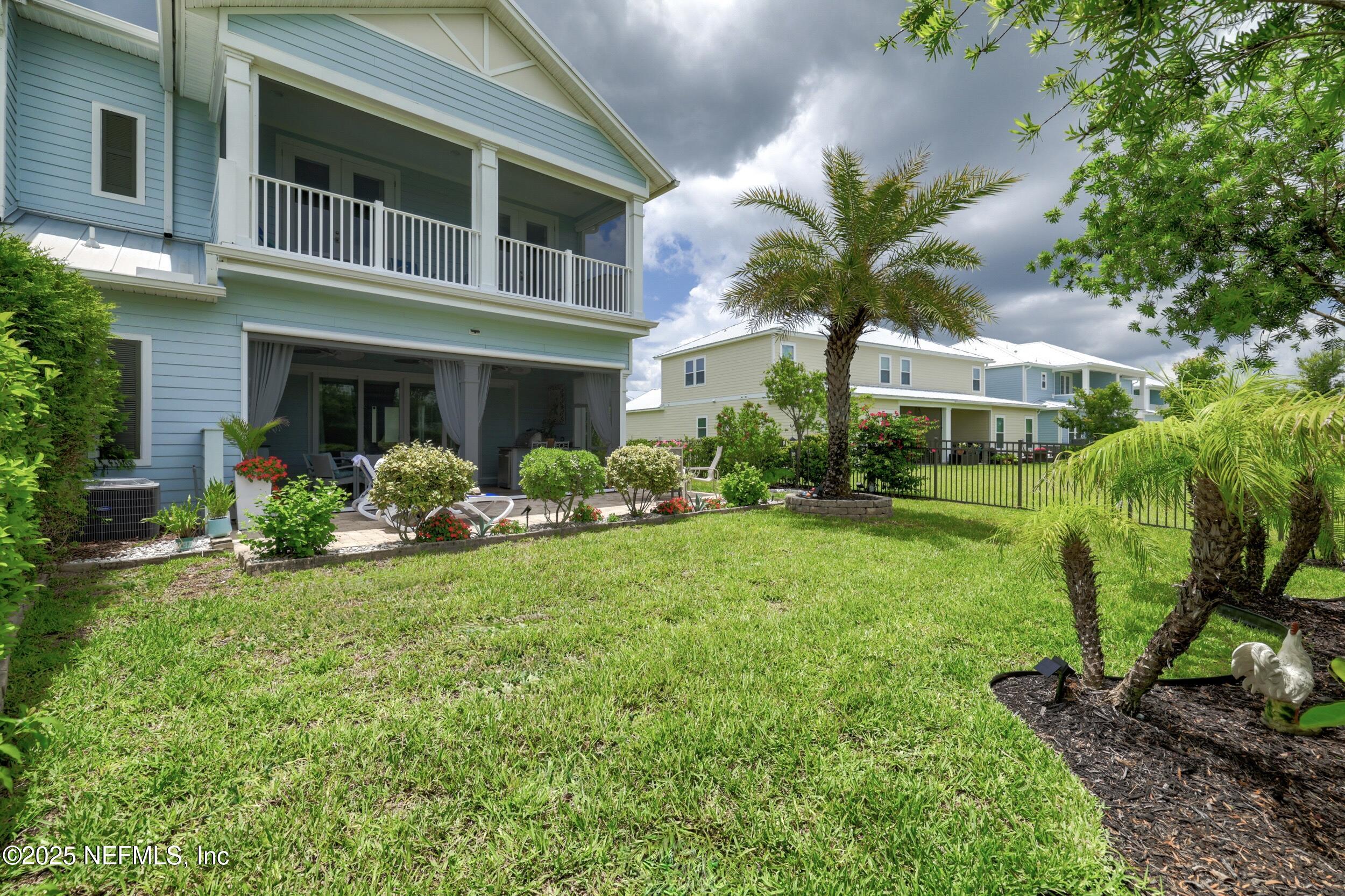 651 Rum Runner Way St. Johns, FL 32259 - Photo 68 of 97 a view of a house with a yard and plants