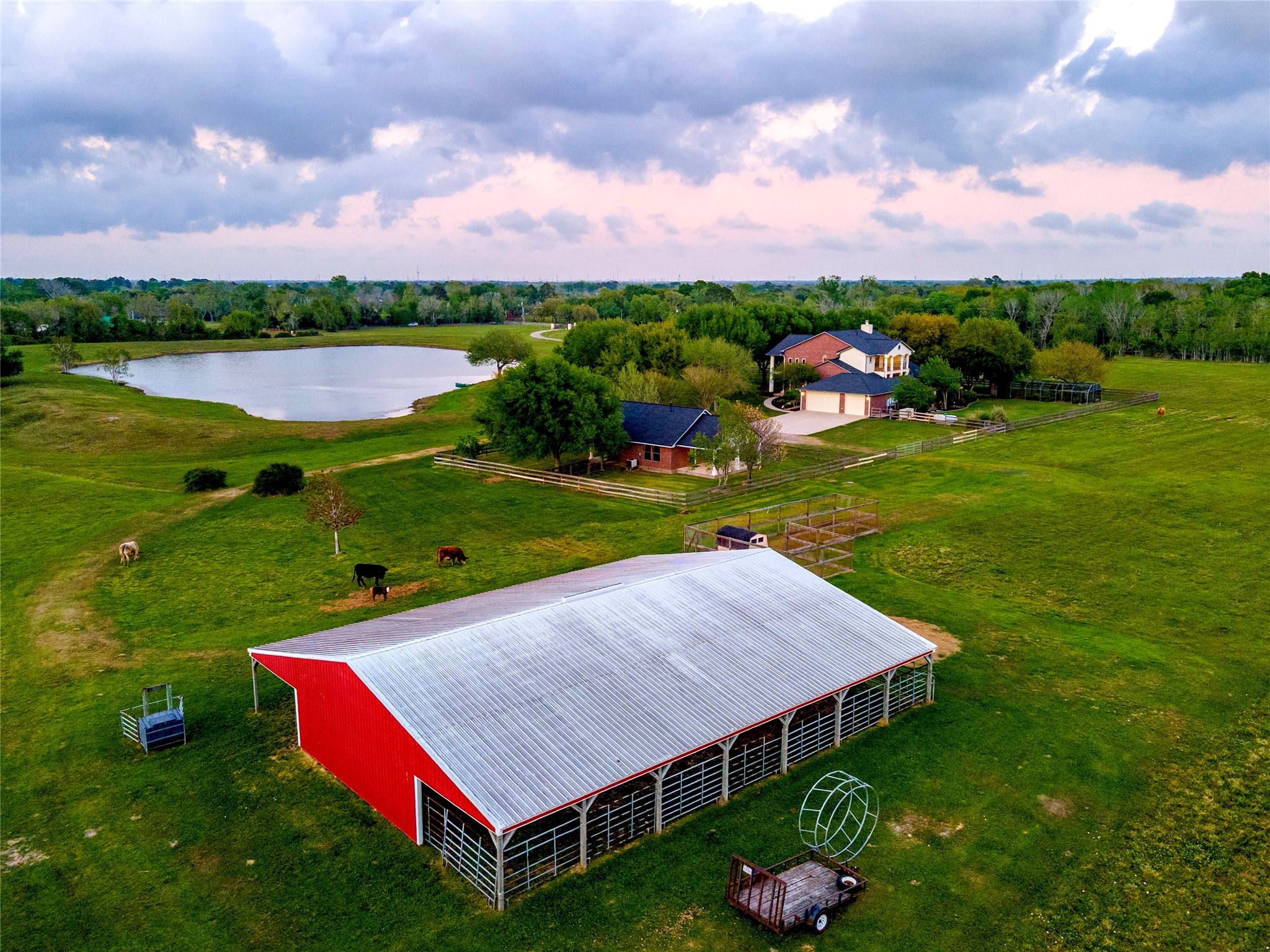 Nestled at the end of a quiet, dead-end street, beyond a Texas-sized gated entrance, 8211 Deats Lane in Dickinson features an extraordinarily picturesque 25-acre estate, offering a rare blend of refined elegance, natural beauty, and complete privacy. Enjoy fresh farm eggs daily with fully enclosed chicken coop, and room for livestock and agricultural projects, making it perfect for school 4-H clubs.