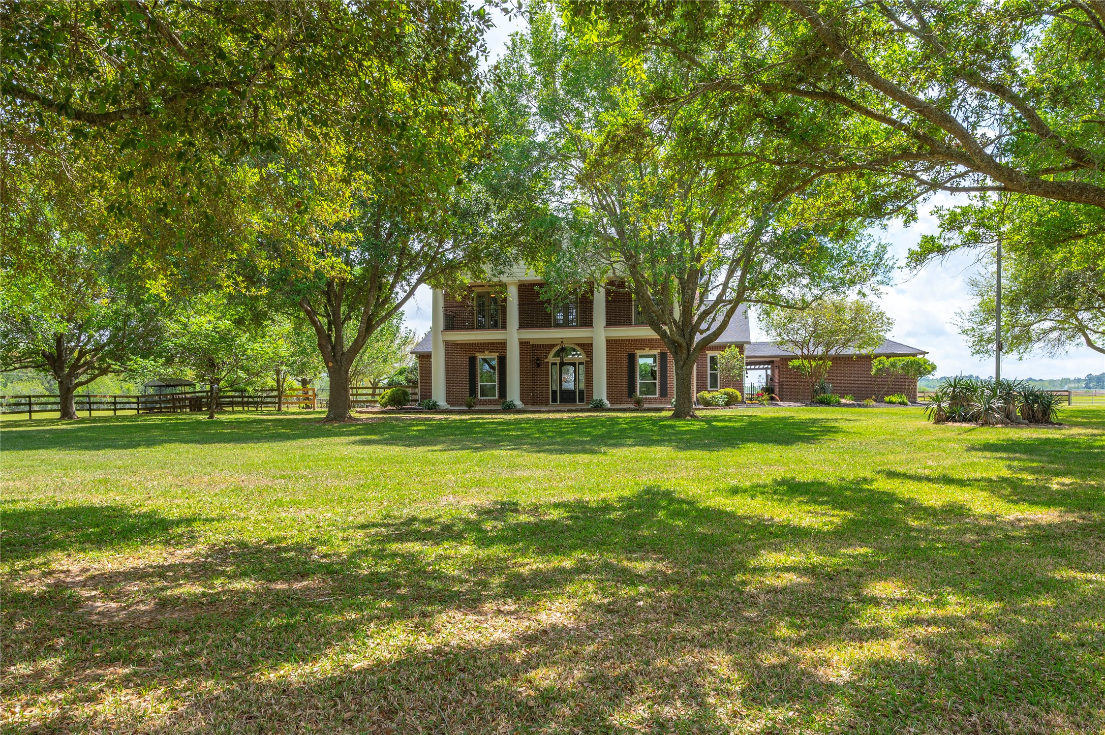 8211 Deats Lane Dickinson, TX 77539 - Photo 13 of 50 a front view of a house with a garden