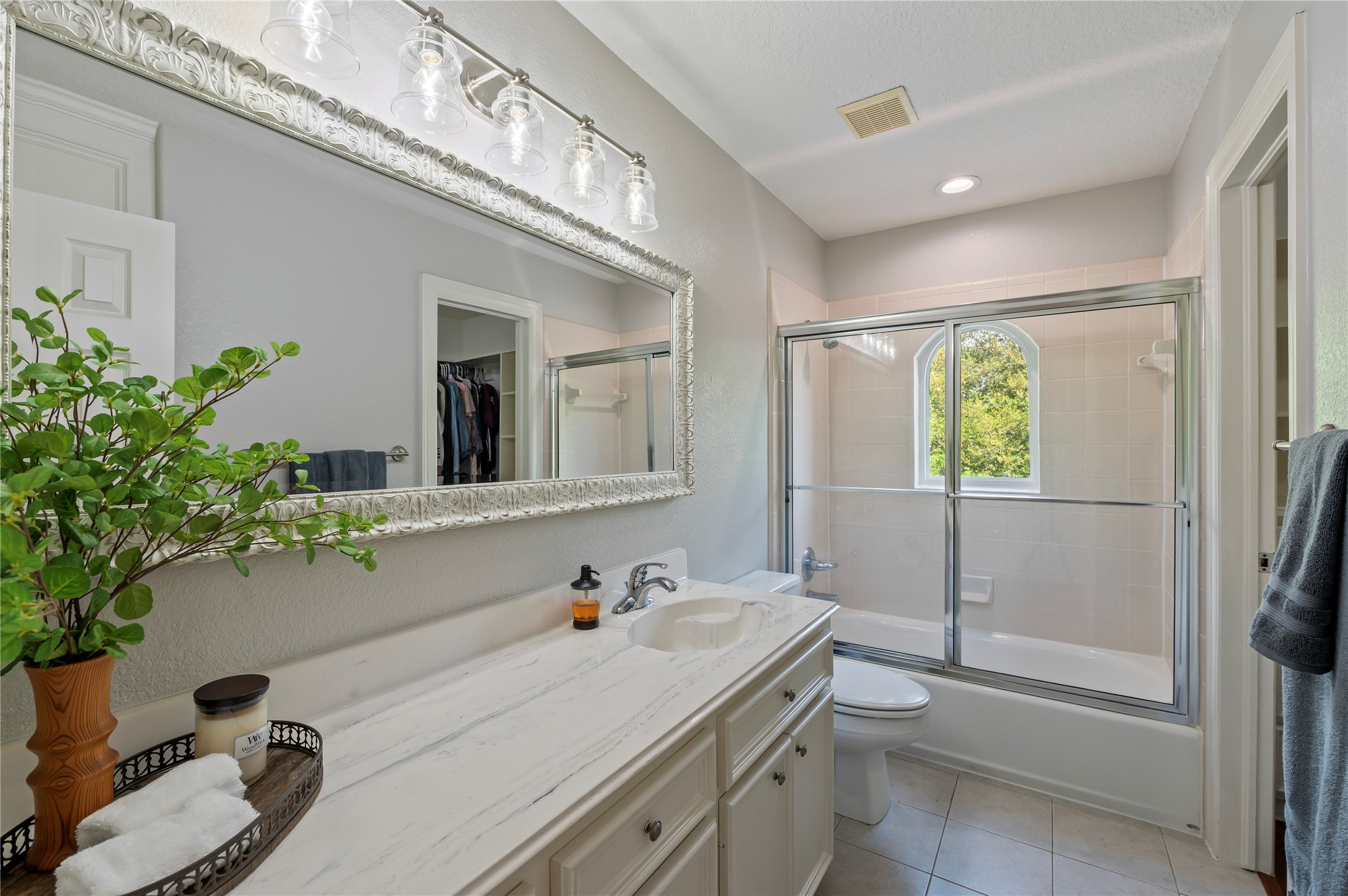 8211 Deats Lane Dickinson, TX 77539 - Photo 37 of 50 a bathroom with a sink toilet and shower
