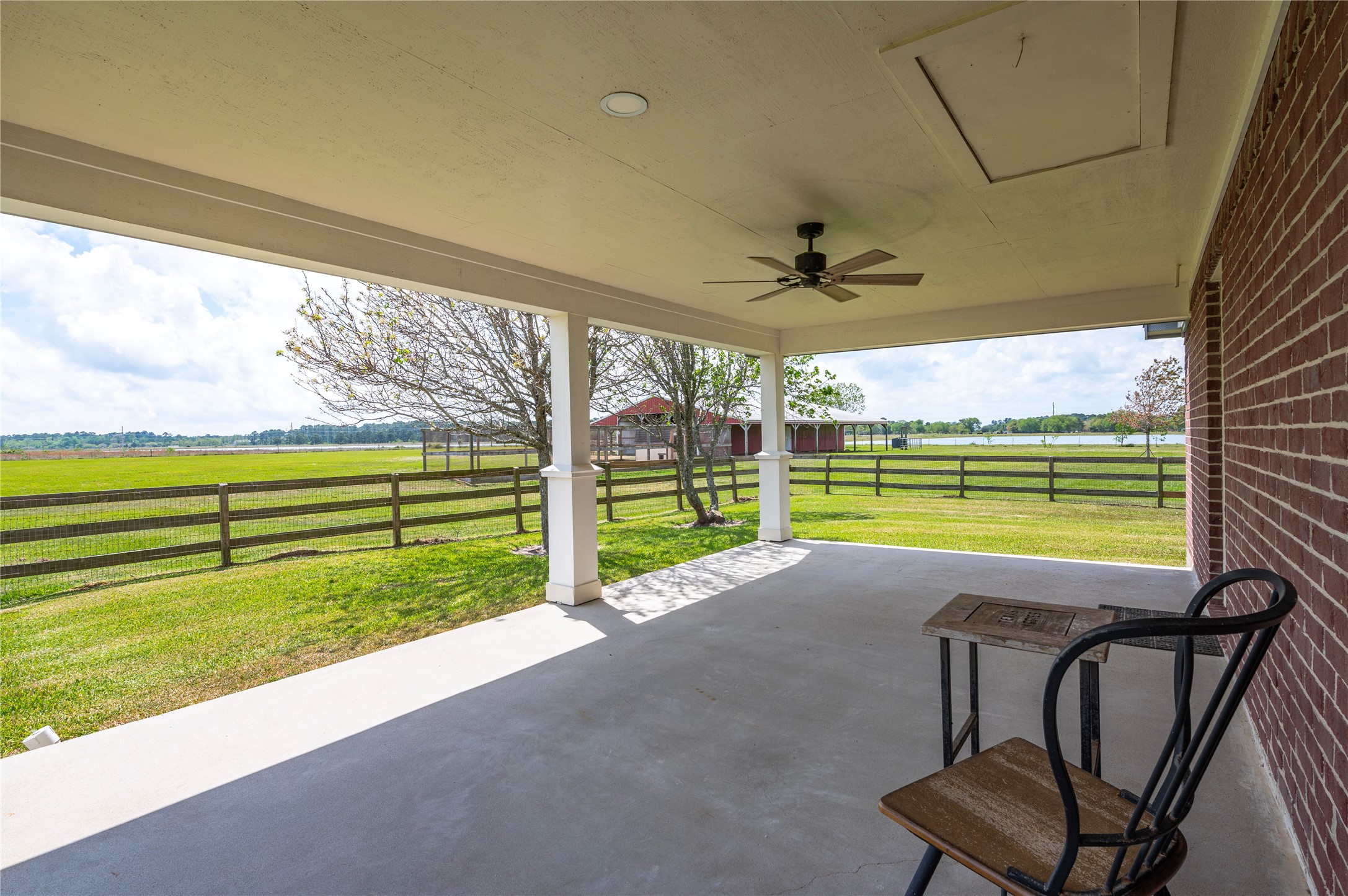 8211 Deats Lane Dickinson, TX 77539 - Photo 44 of 50 The guest house is perfect for guests or multi-generational living; also features a large covered back patio overlooking the picturesque grounds and barn.