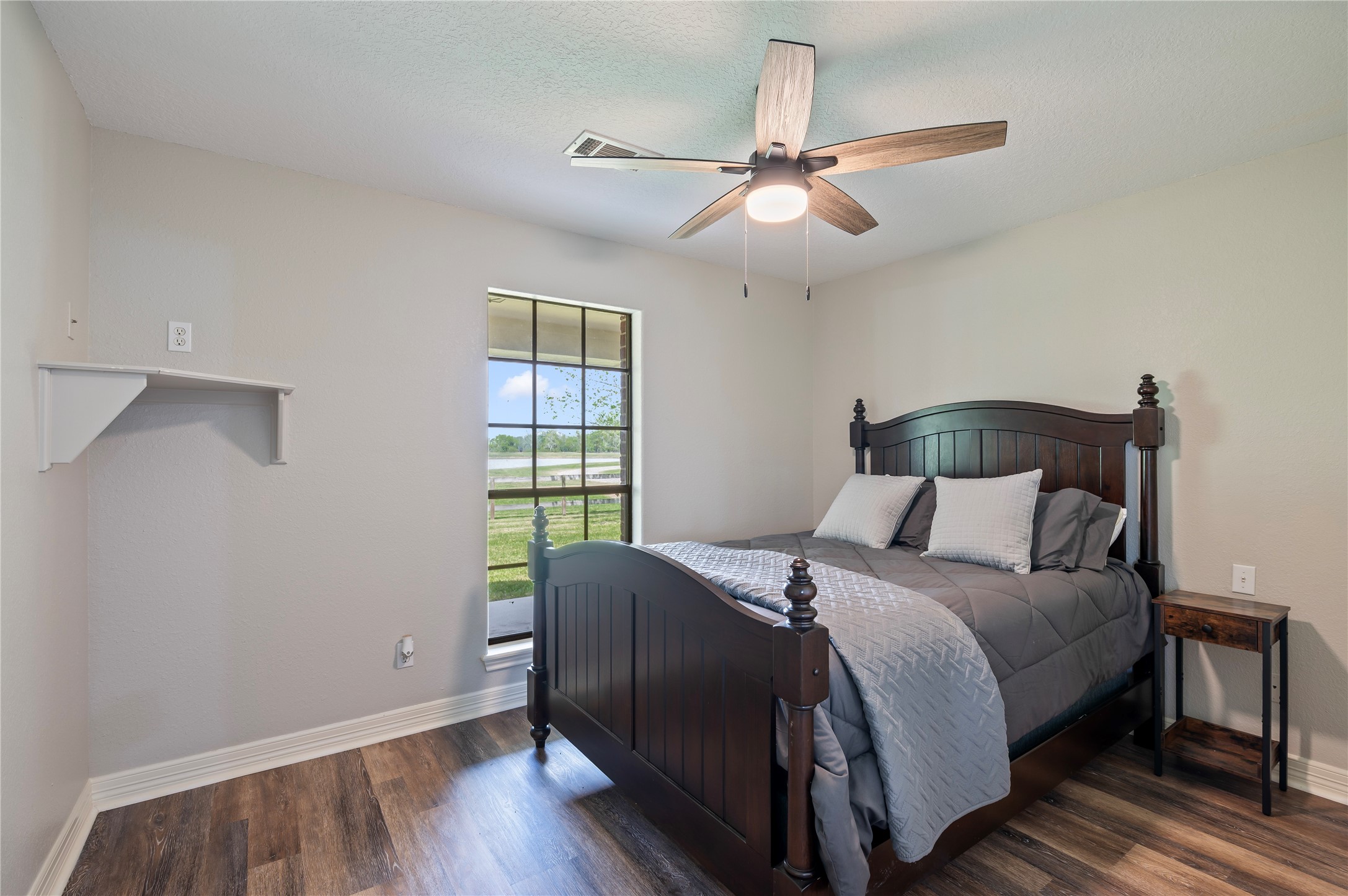 8211 Deats Lane Dickinson, TX 77539 - Photo 47 of 50 a bedroom with a bed and window