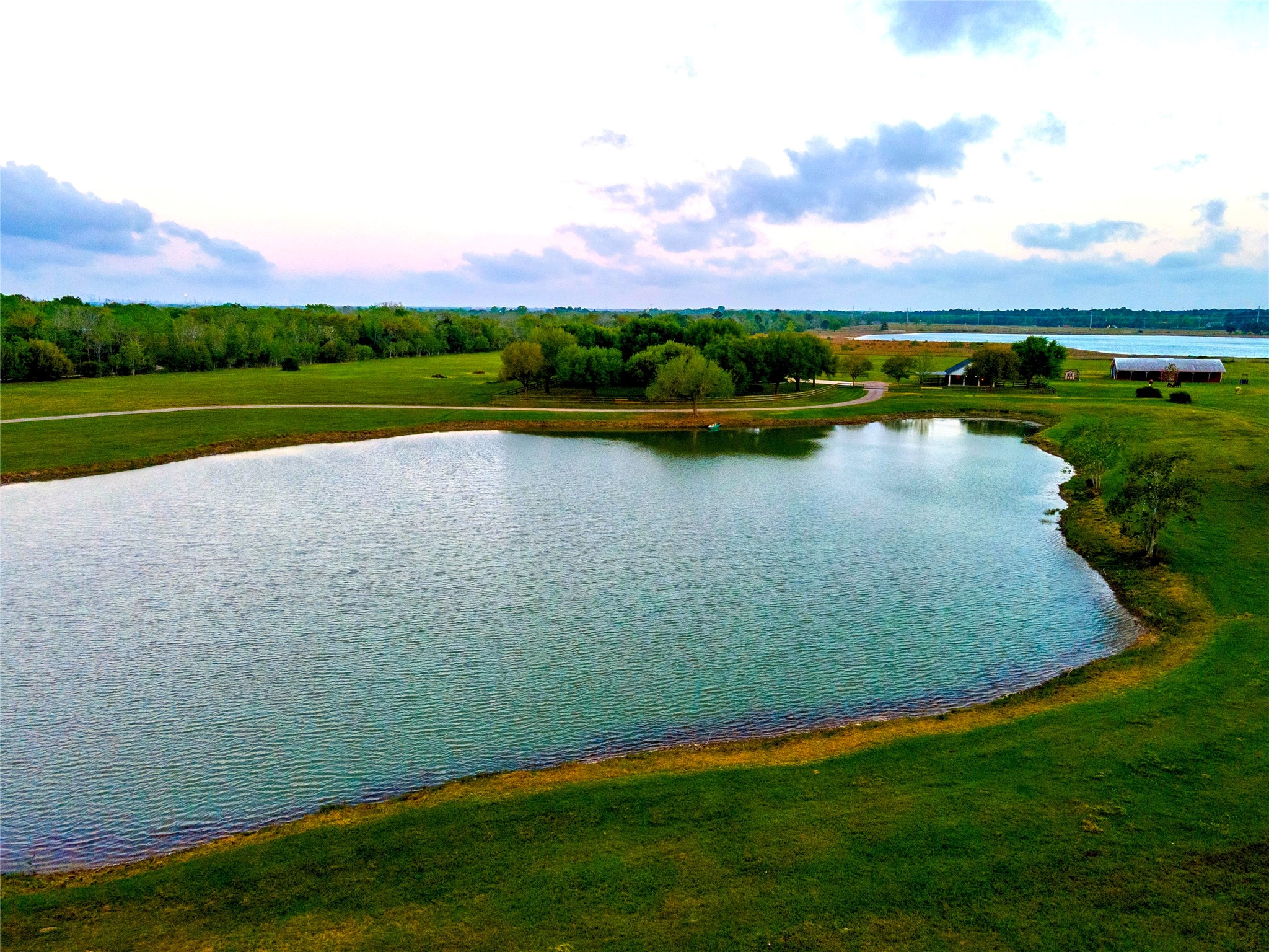 8211 Deats Lane Dickinson, TX 77539 - Photo 8 of 50 a view of a lake with houses in the back