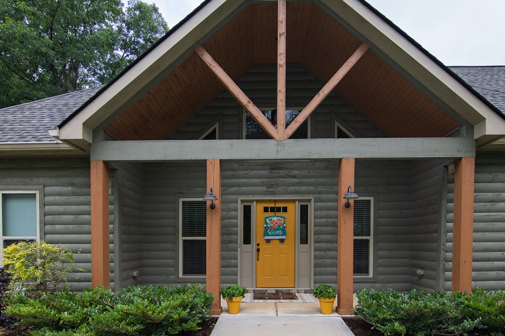 299 Savior Lane Hamilton, GA 31811 - Photo 4 of 92 a front view of a house with a garage