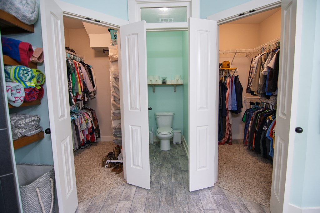 299 Savior Lane Hamilton, GA 31811 - Photo 44 of 92 a view of walk in closet with clothes and shoes