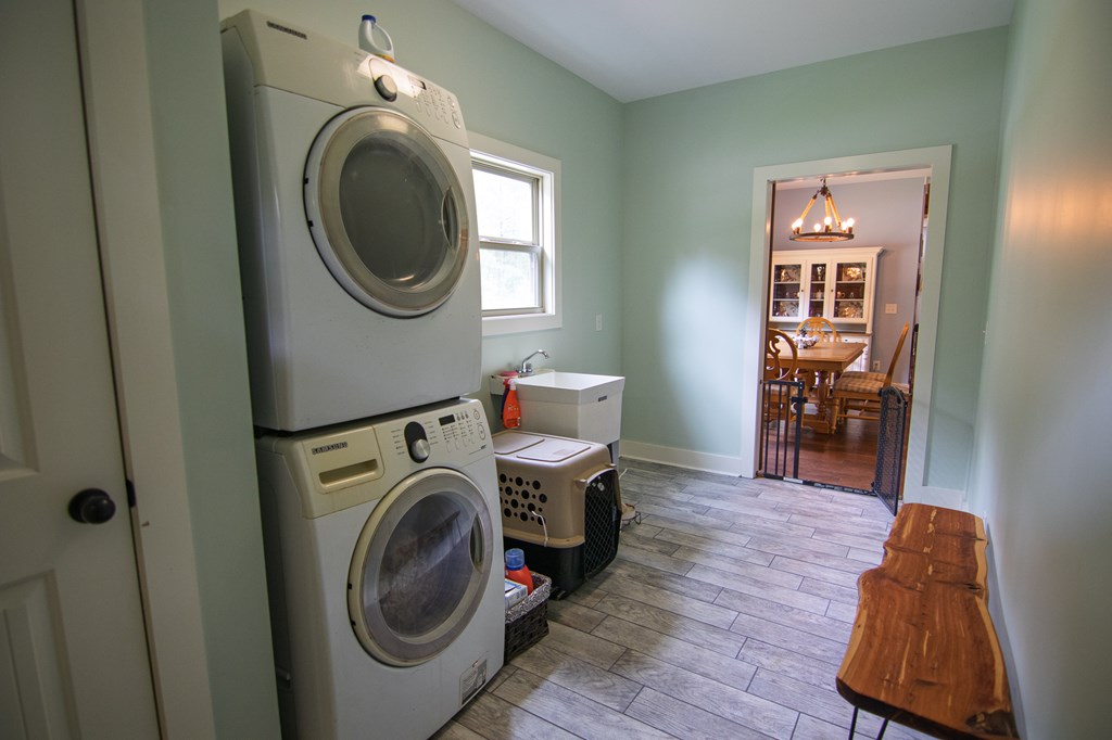 299 Savior Lane Hamilton, GA 31811 - Photo 57 of 92 a view of a bedroom with washer and dryer