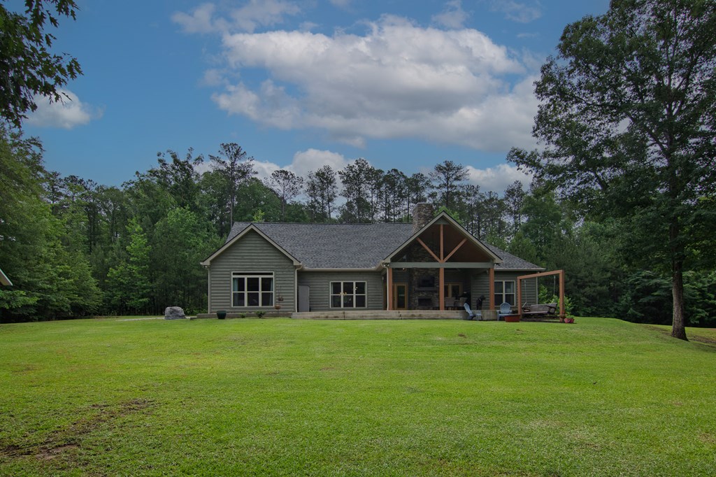 299 Savior Lane Hamilton, GA 31811 - Photo 59 of 92 a front view of house with yard and green space