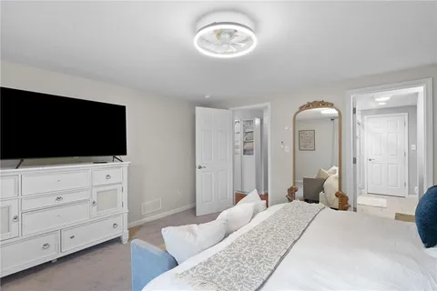 a bathroom with a granite countertop sink mirror and double