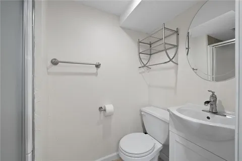 a view of a house with a yard and furniture