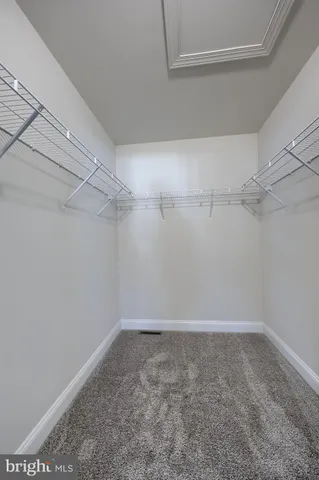 a view of a room with racks on the wall