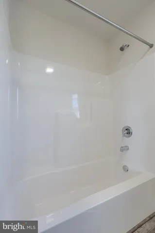 a close up of a bathtub