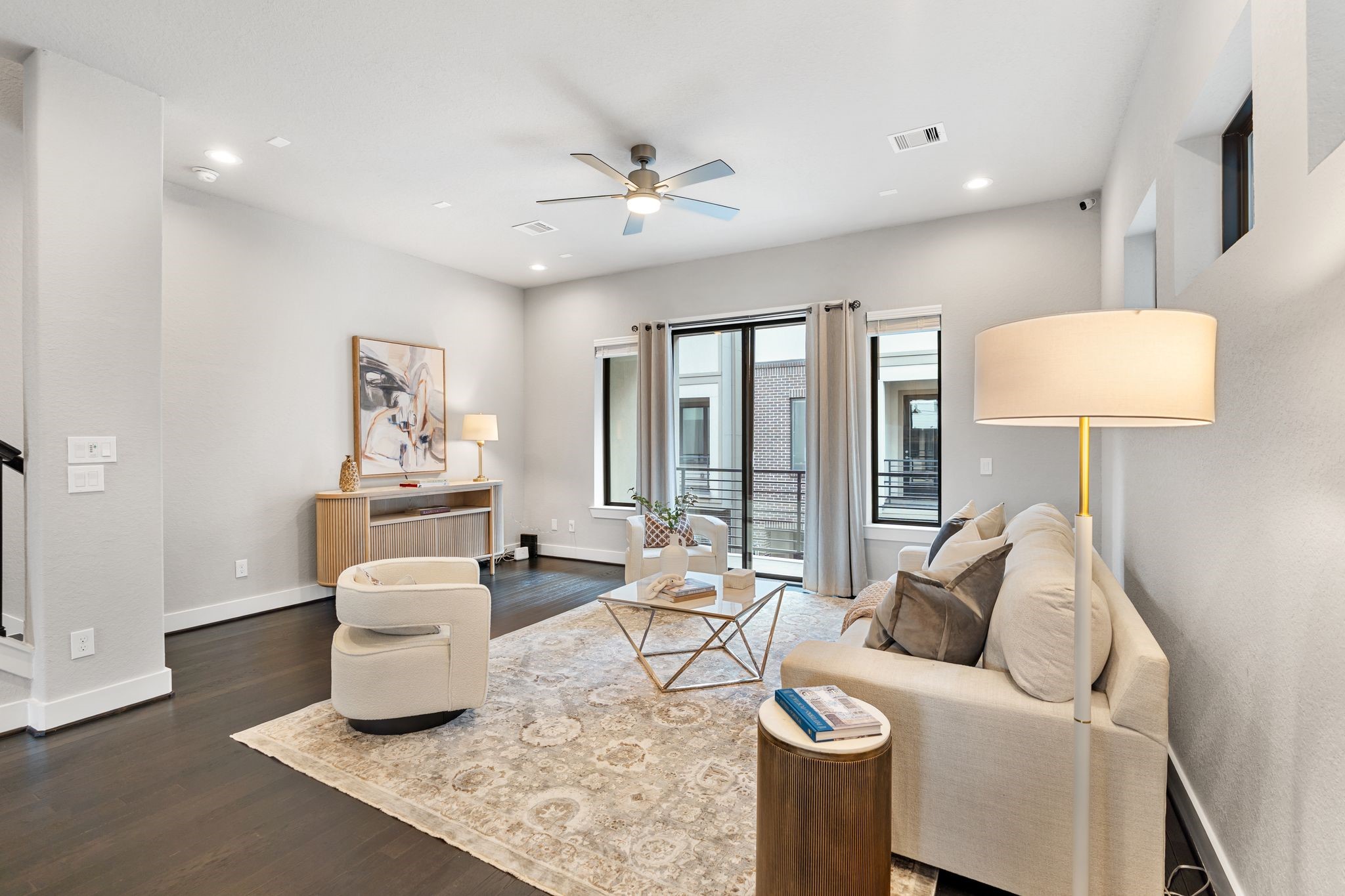 4219 Allen Street Houston, TX 77007 - Photo 11 of 29 a living room with furniture and a lamp