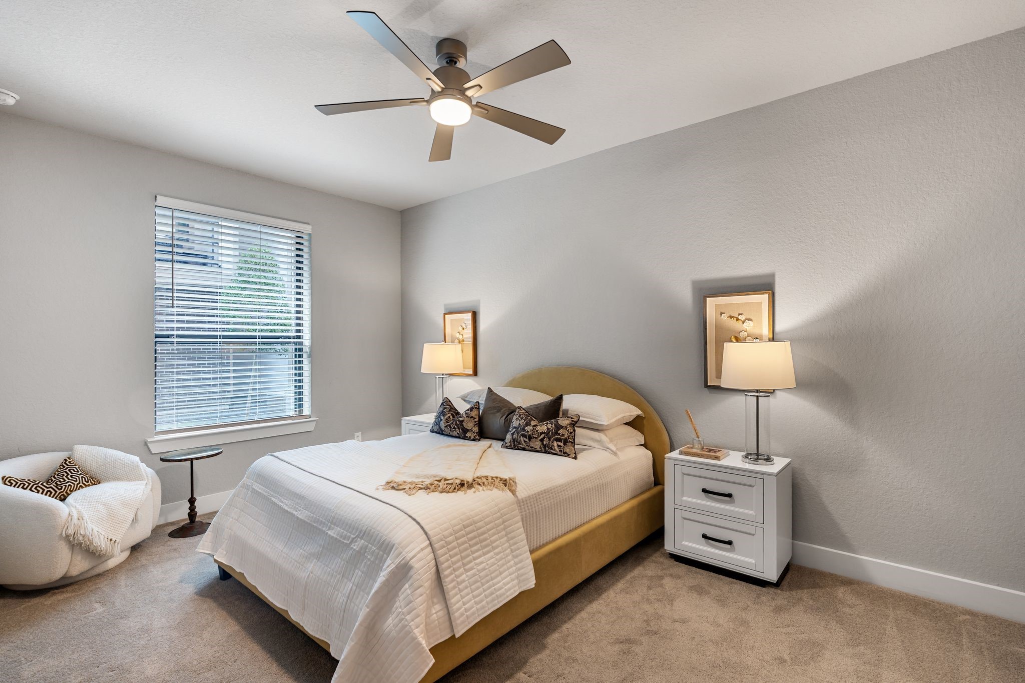 4219 Allen Street Houston, TX 77007 - Photo 21 of 29 a bedroom with a bed and a chandelier