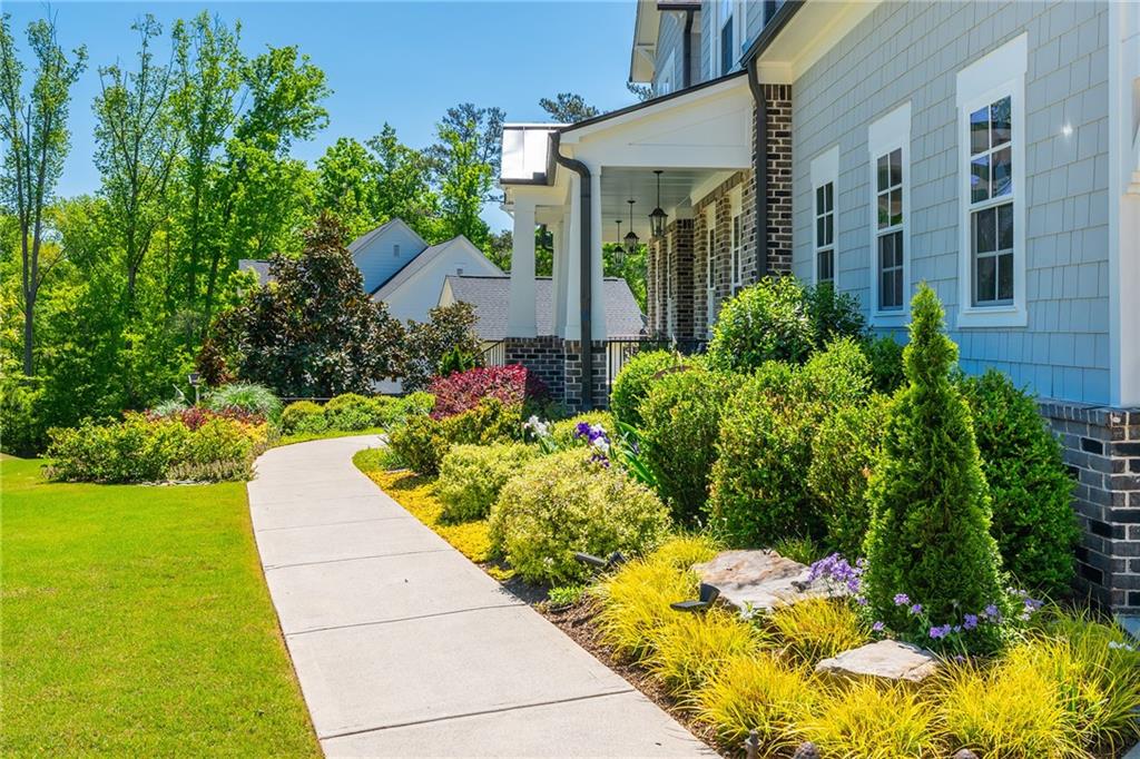 135 Milestone Trail Milton, GA 30004 - Photo 7 of 88 a view of a garden with potted plants