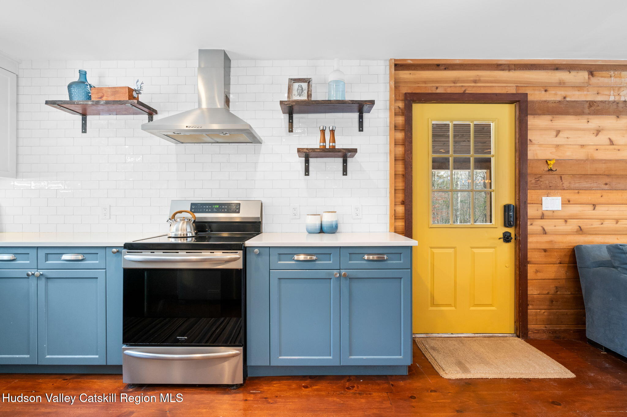 153 Slater Road Windham, NY 12454 - Photo 13 of 38 a kitchen with stainless steel appliances granite countertop a stove and a sink