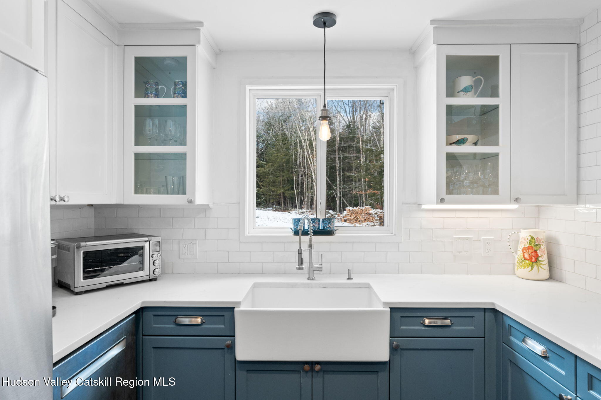 153 Slater Road Windham, NY 12454 - Photo 14 of 38 a kitchen with a sink and a window