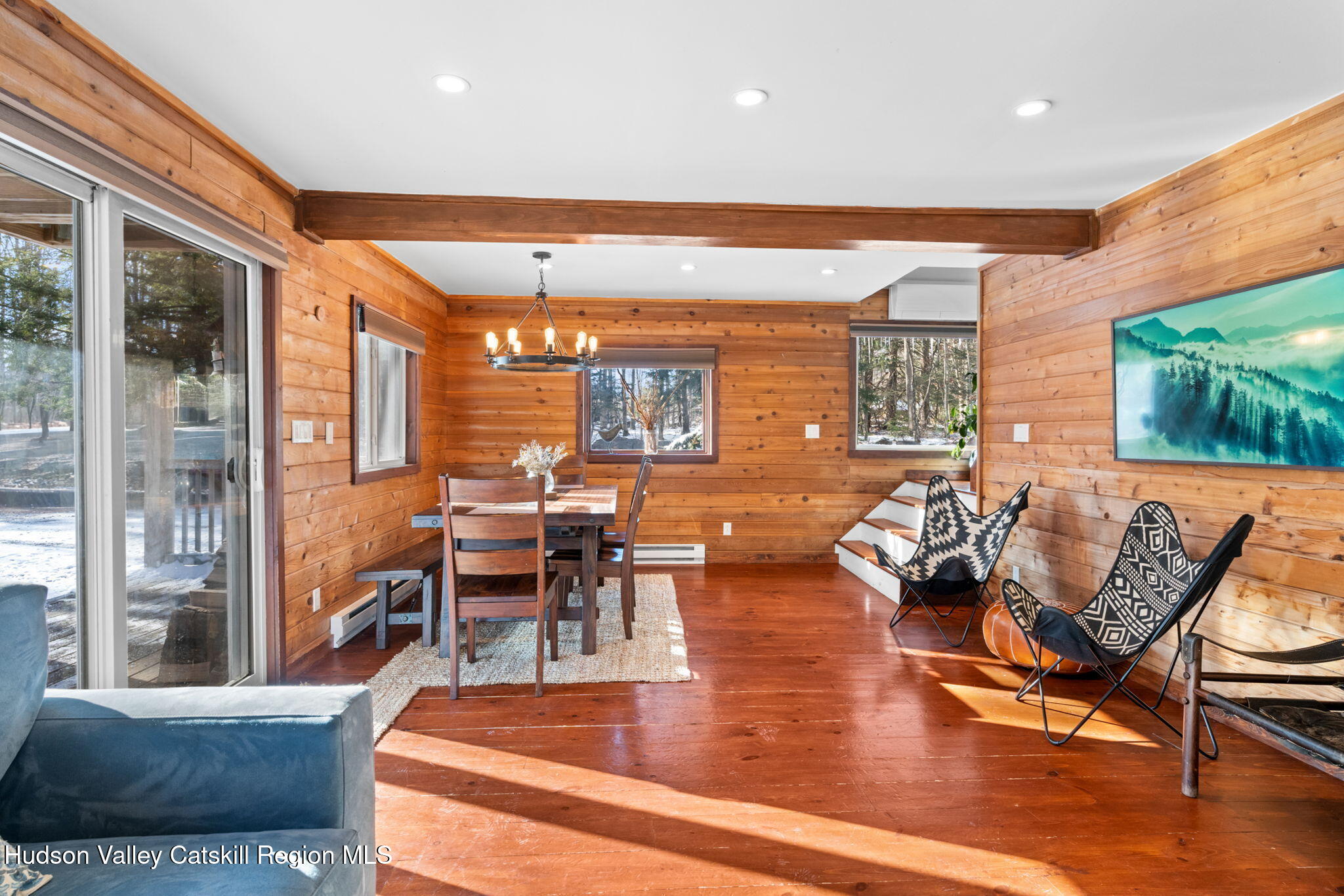 153 Slater Road Windham, NY 12454 - Photo 19 of 38 a living room with fireplace furniture and a large window