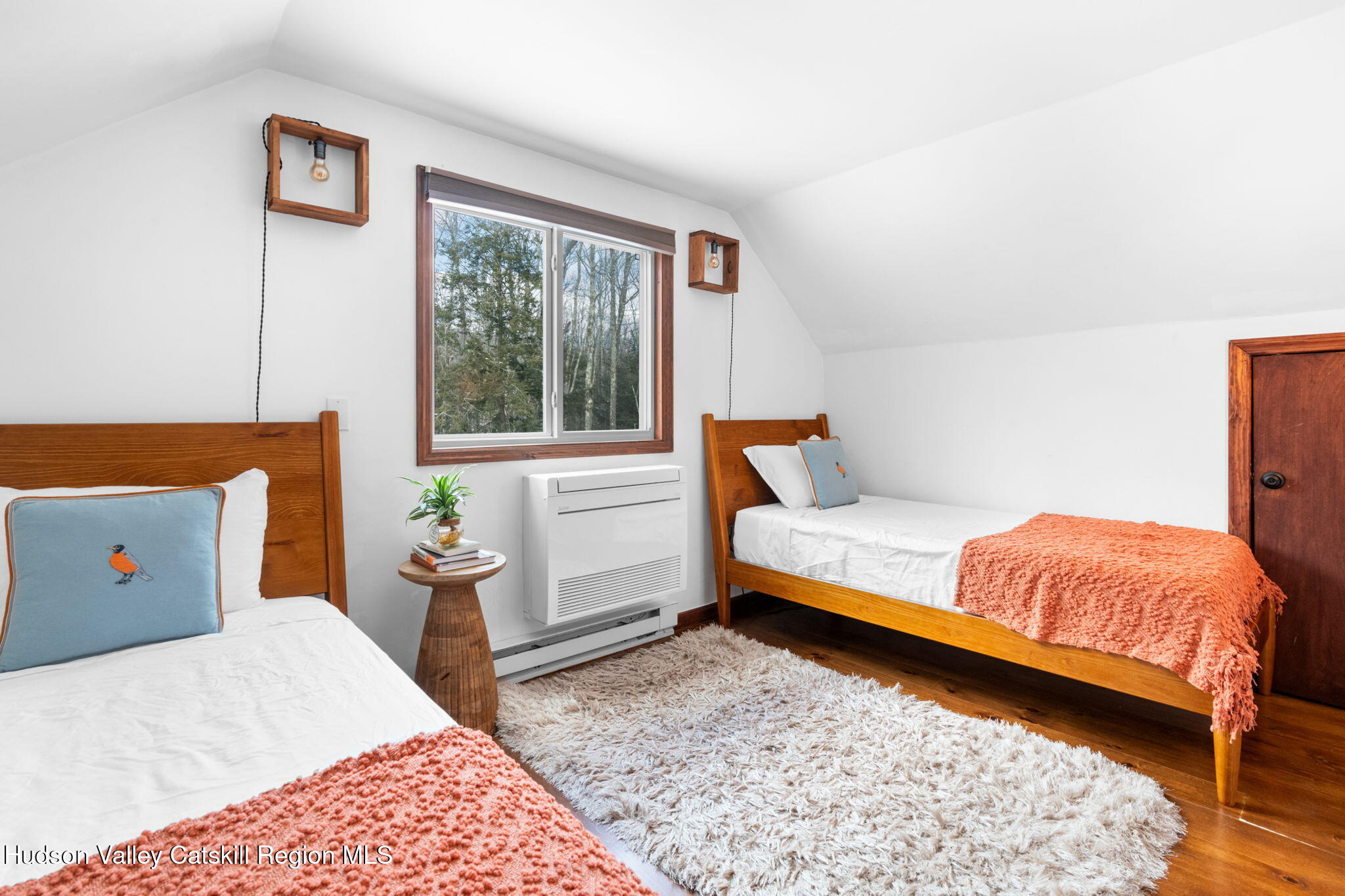 153 Slater Road Windham, NY 12454 - Photo 28 of 38 a bedroom with a bed and wooden floor