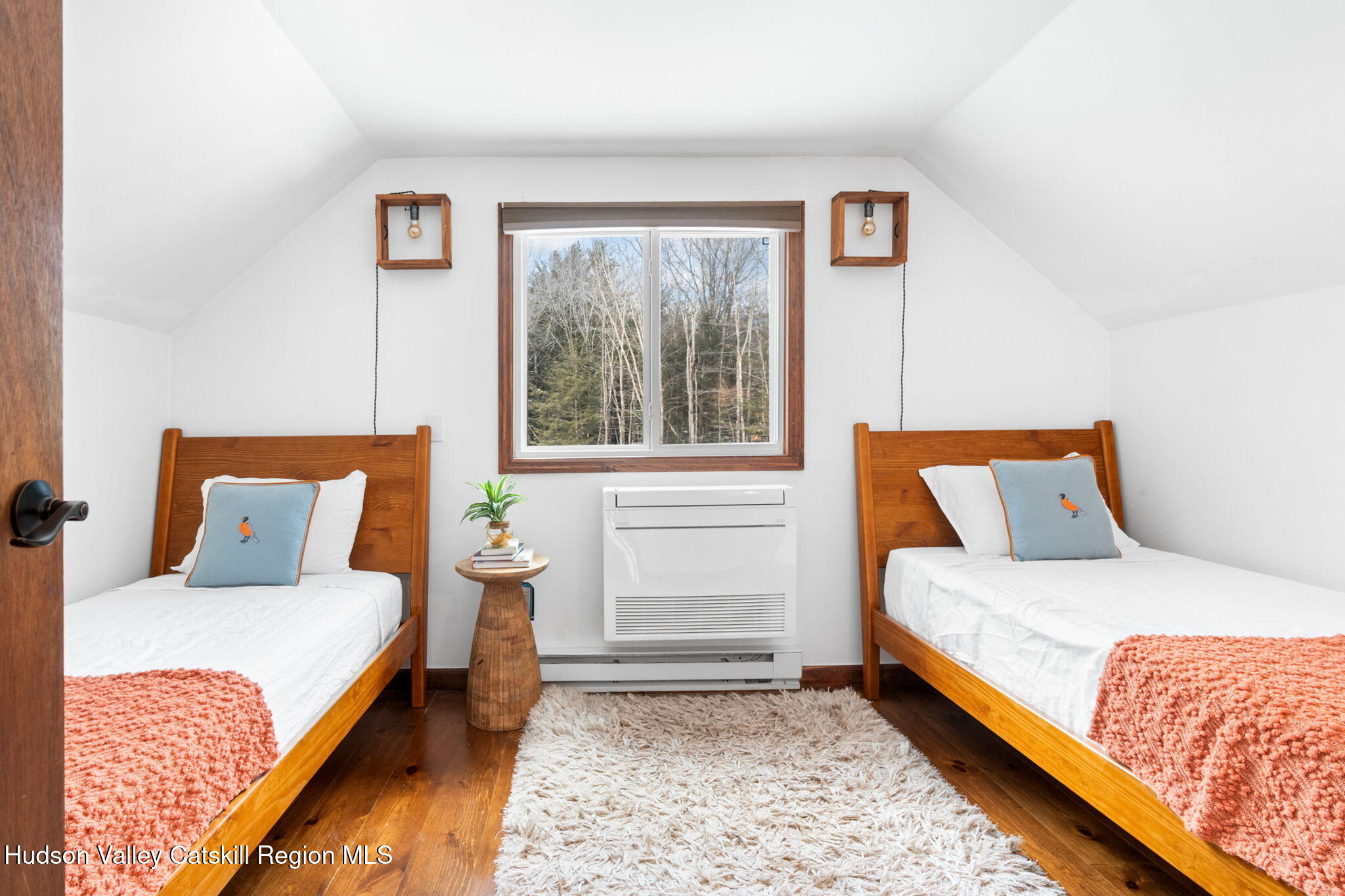 153 Slater Road Windham, NY 12454 - Photo 29 of 38 a bedroom with a bed and window