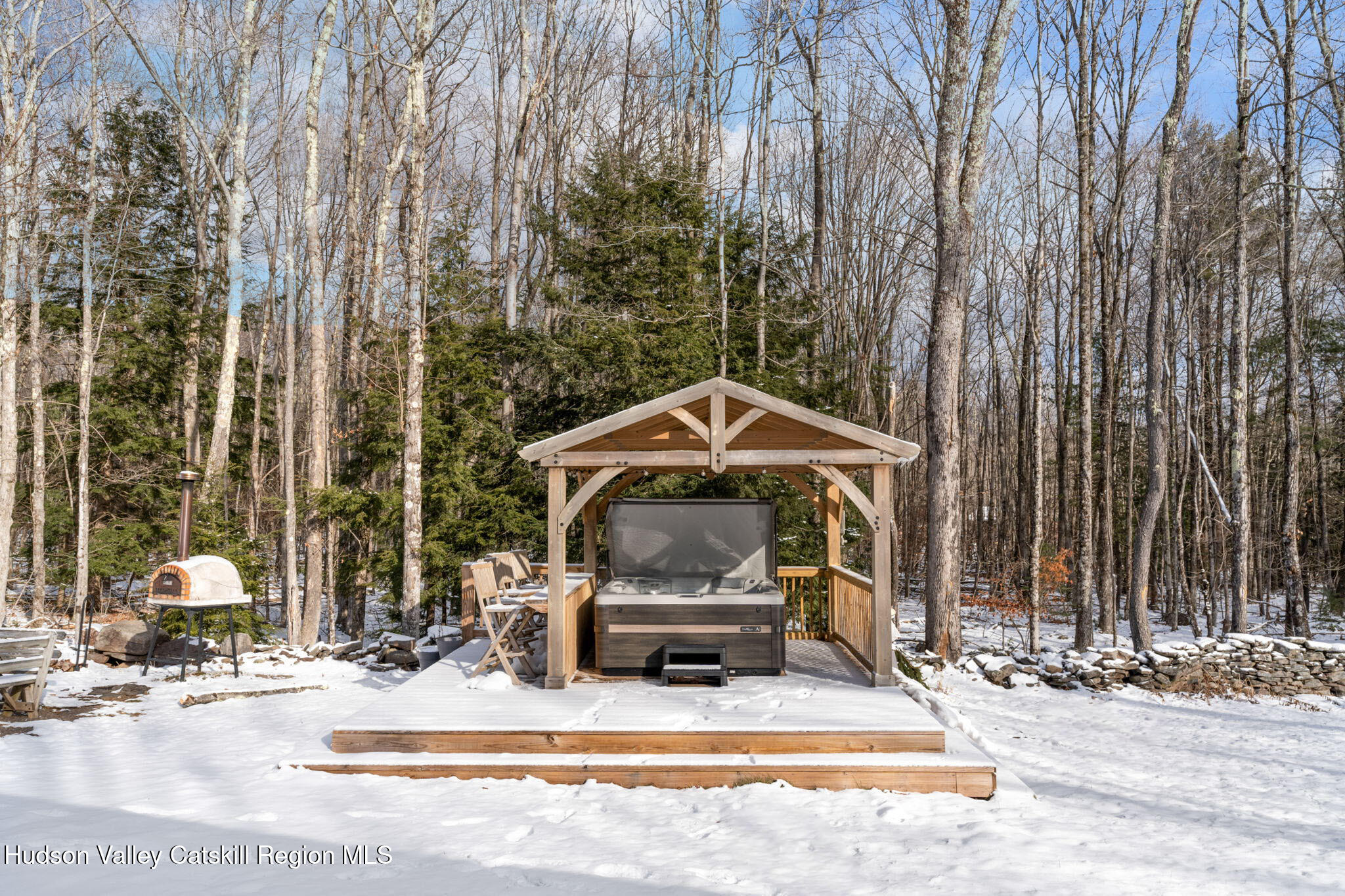 153 Slater Road Windham, NY 12454 - Photo 33 of 38 a white house that has a tree in front of it