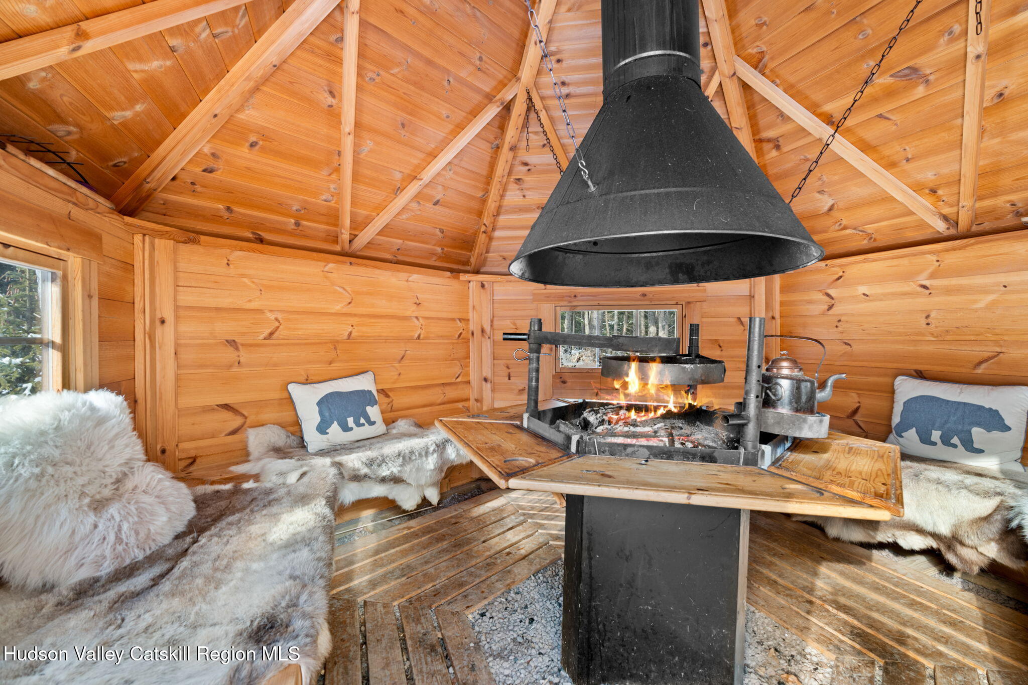 153 Slater Road Windham, NY 12454 - Photo 7 of 38 a view of a kitchen with a sink and wooden cabinets