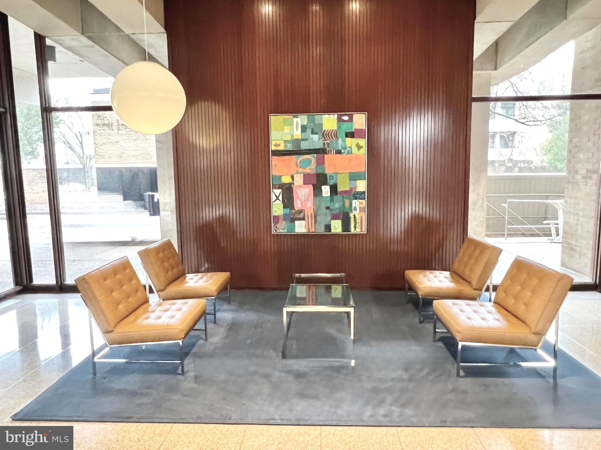 430 M Street Southwest, Unit N502 Washington, DC 20024 - Photo 11 of 27 a living room with furniture and a large window