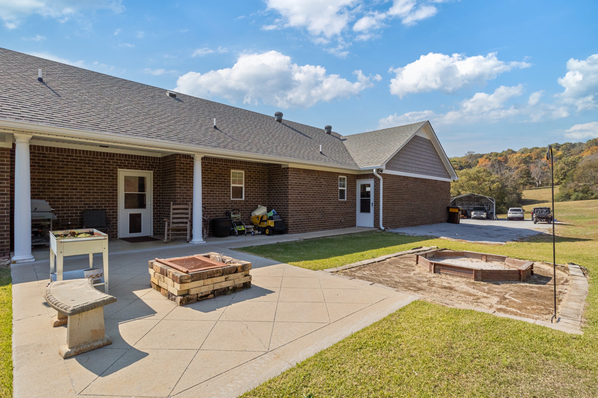 1313 Iron Bridge Road Columbia, TN 38401 - Photo 54 of 70 a view of a house with swimming pool and porch with furniture
