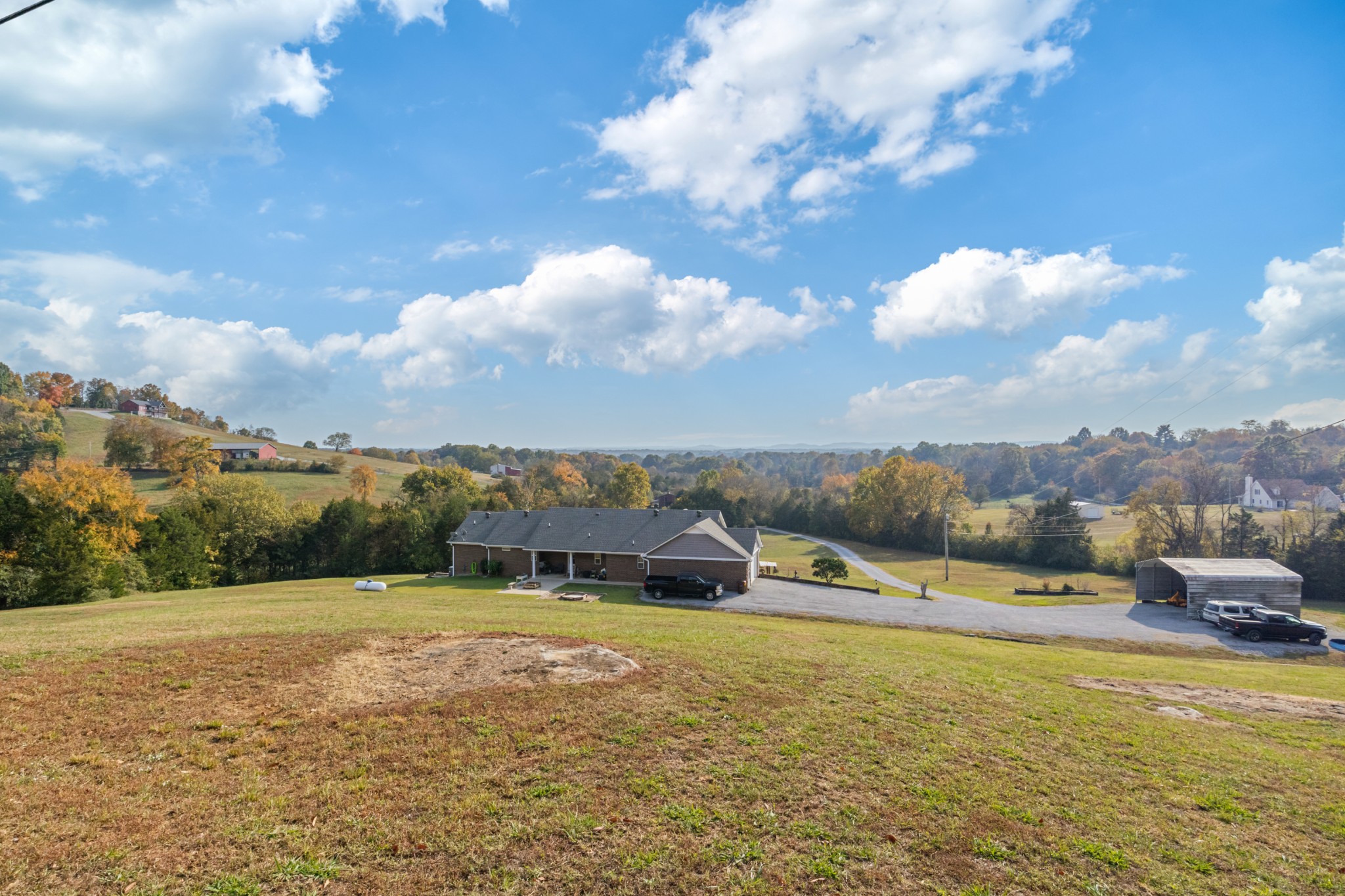 1313 Iron Bridge Road Columbia, TN 38401 - Photo 55 of 70 a view of a lake with houses in the back