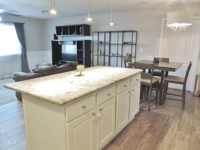 a kitchen with a stove and a microwave