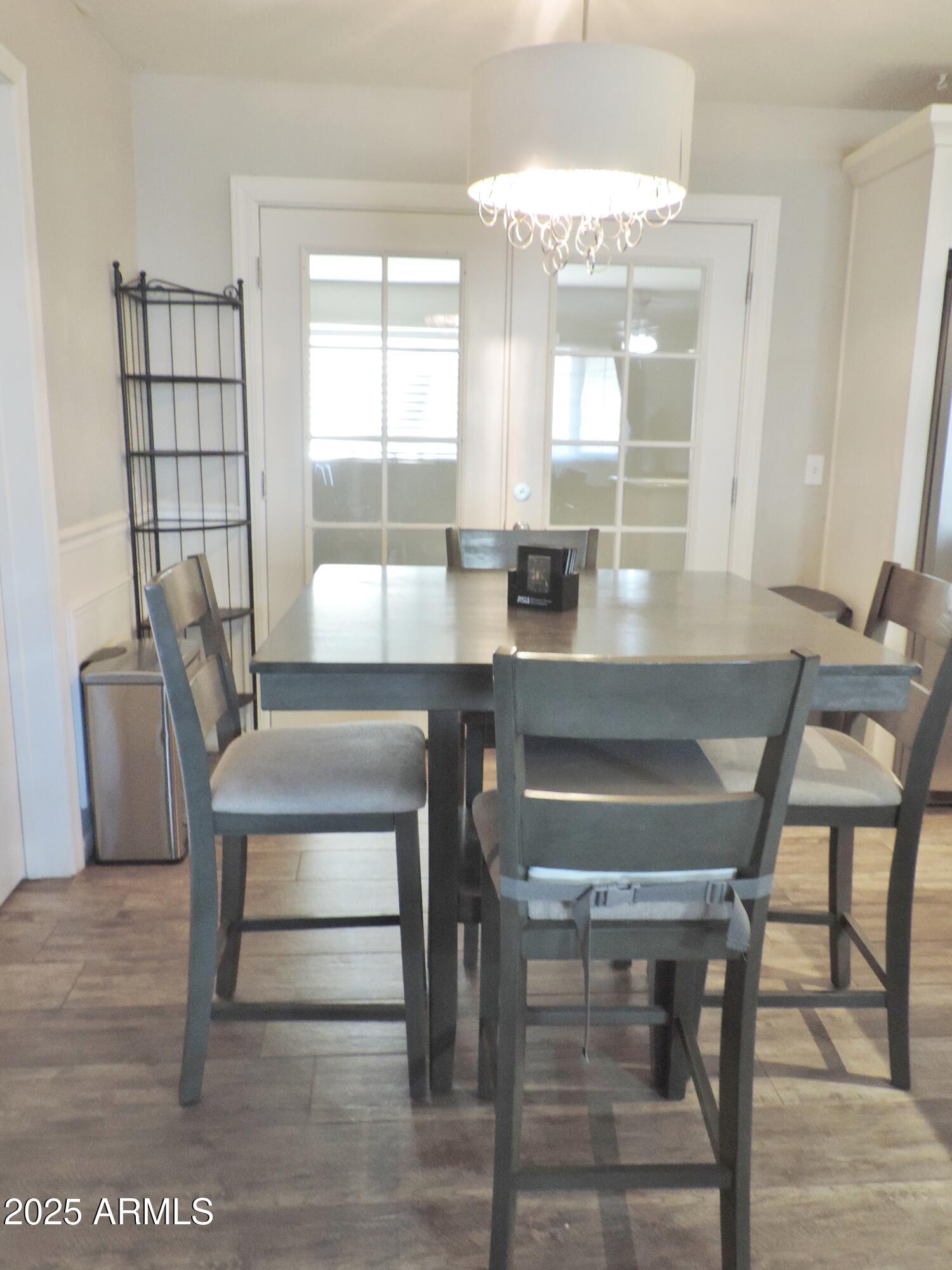 764 North Thunderbird Drive Apache Junction, AZ 85120 - Photo 16 of 74 a view of a dining room with furniture and window