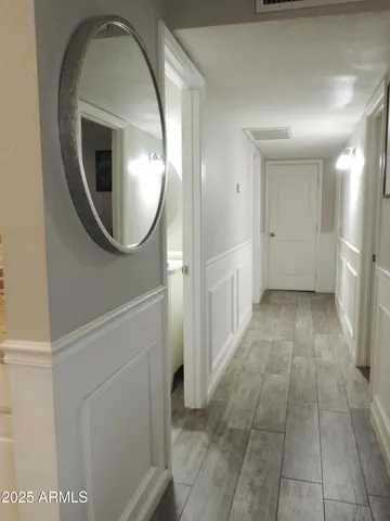 a view of a street with a palm trees