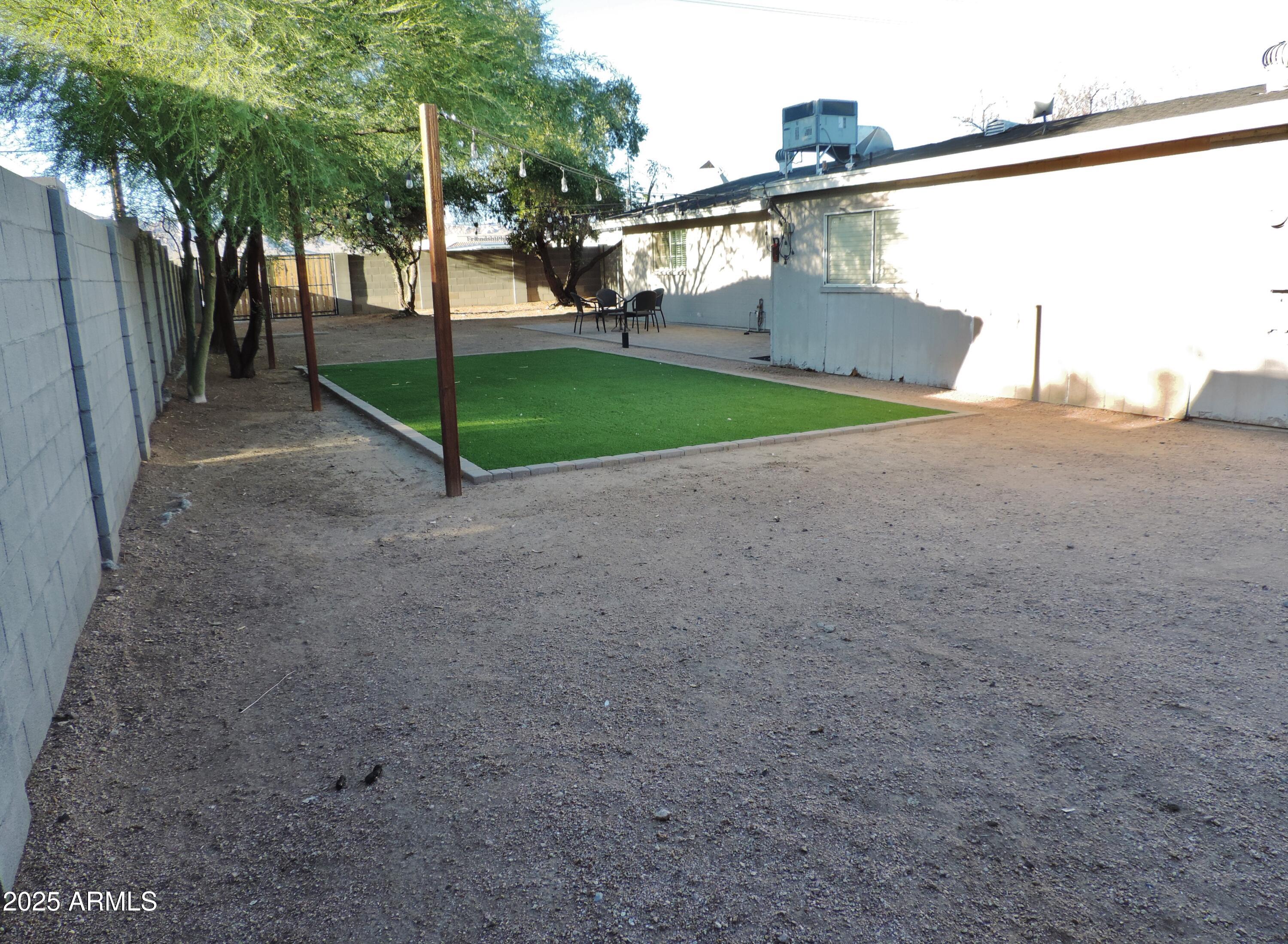 764 North Thunderbird Drive Apache Junction, AZ 85120 - Photo 47 of 74 a view of a street with a palm trees