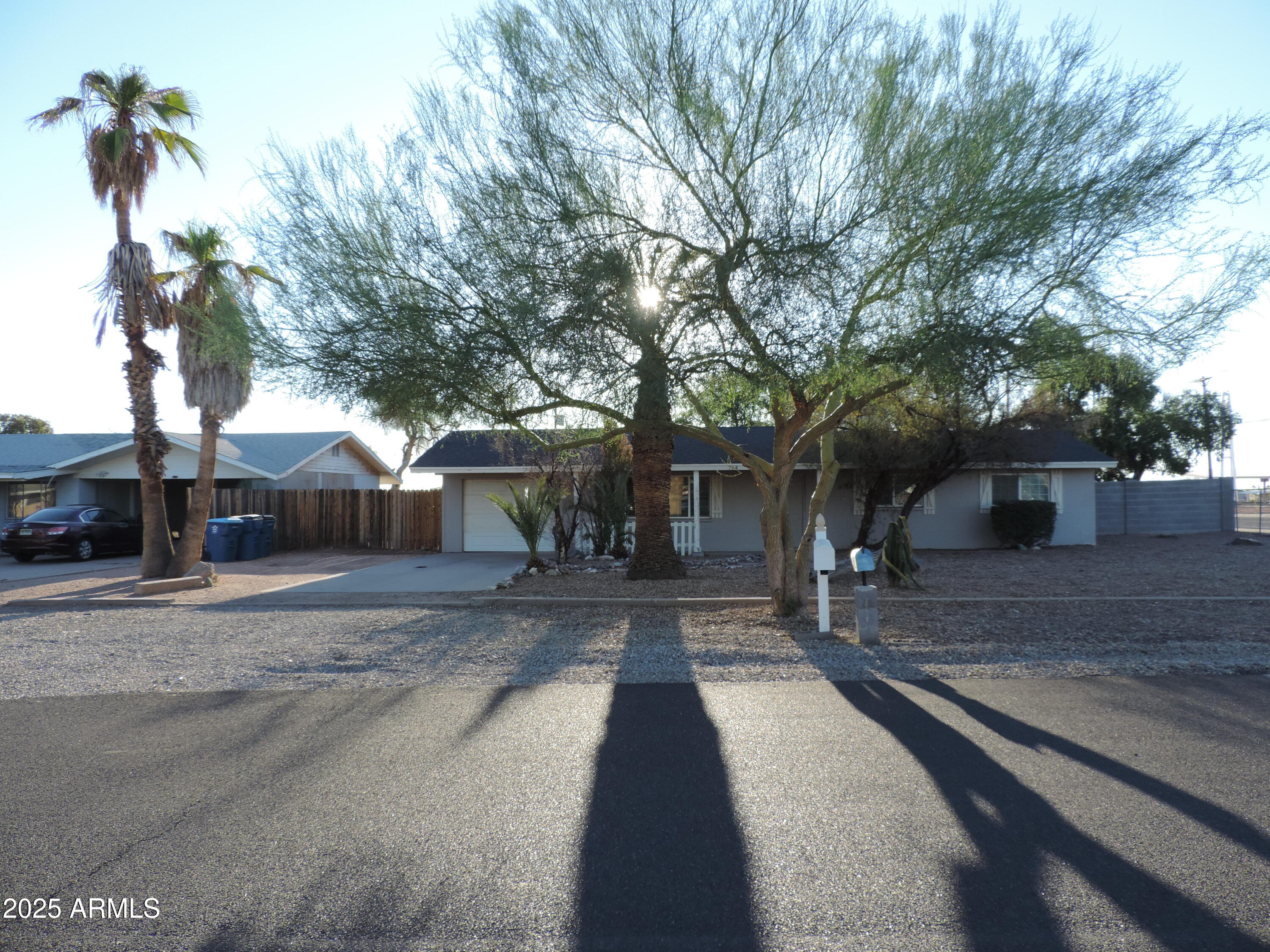 764 North Thunderbird Drive Apache Junction, AZ 85120 - Photo 55 of 74 a front view of a house with a yard