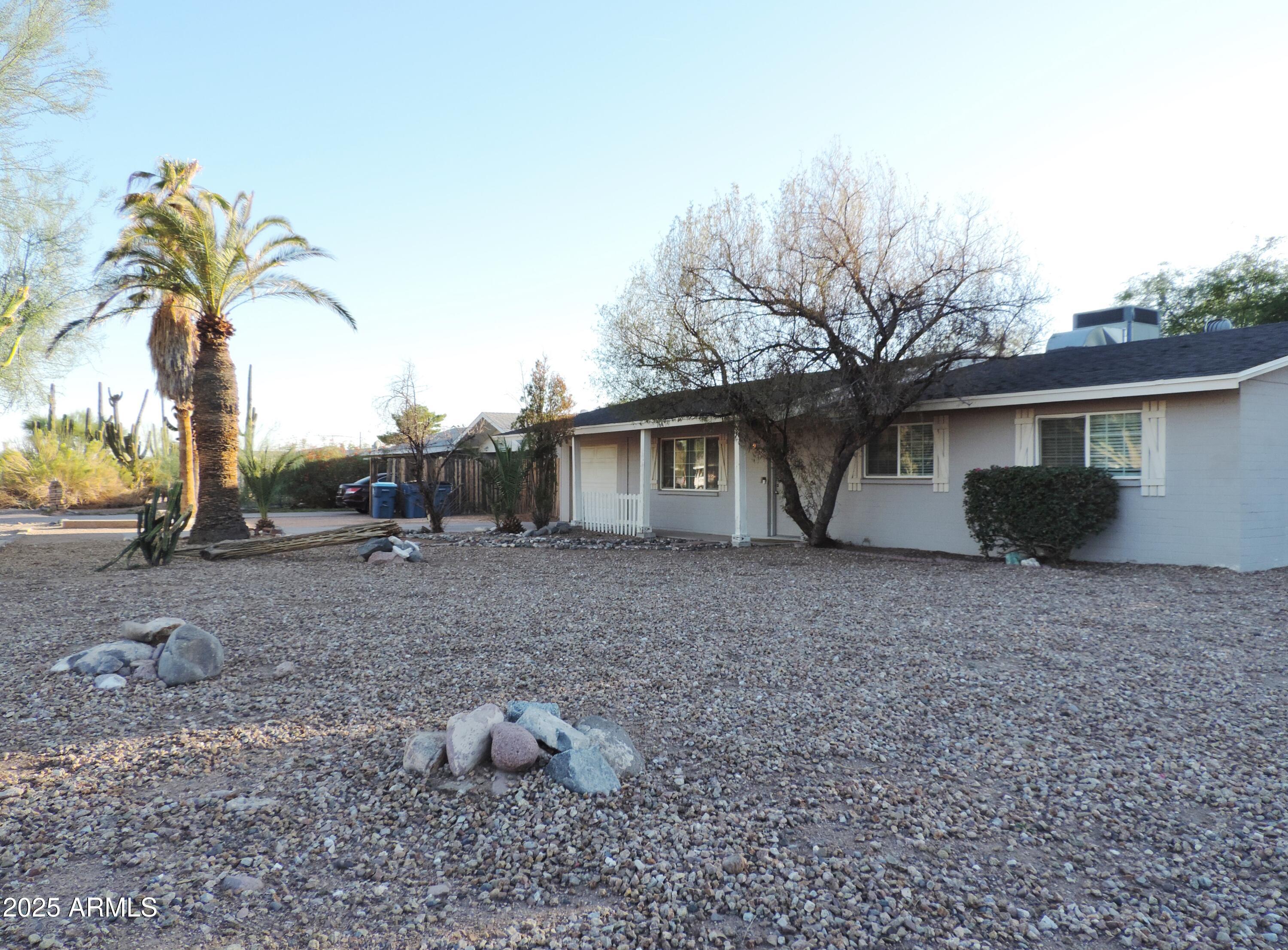 764 North Thunderbird Drive Apache Junction, AZ 85120 - Photo 61 of 74 a view of a house with backyard and trees