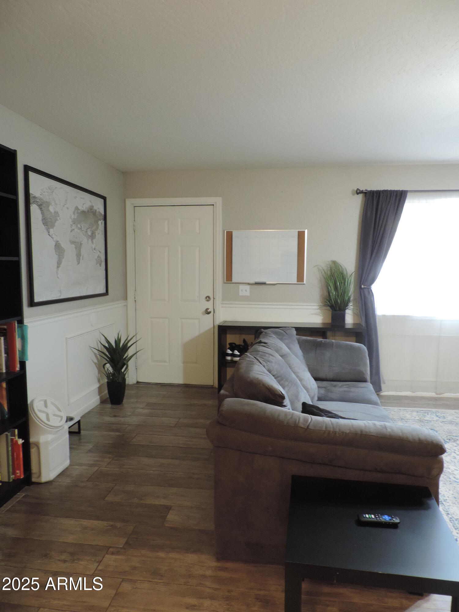 764 North Thunderbird Drive Apache Junction, AZ 85120 - Photo 10 of 74 a living room with furniture and a potted plant