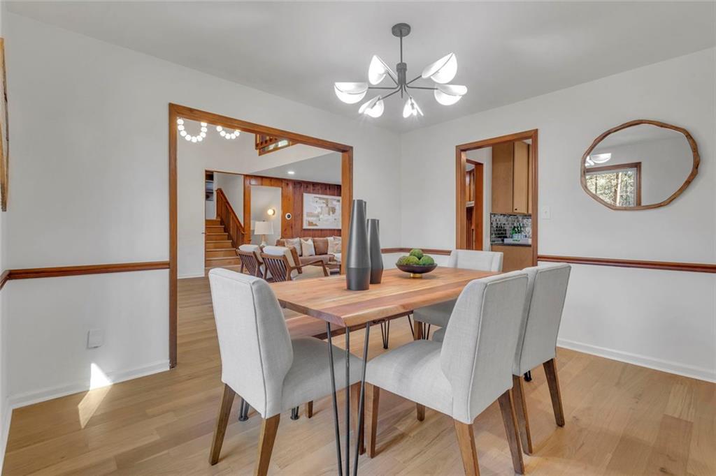 260 Devilla Trace Fayetteville, GA 30214 - Photo 20 of 47 a view of a dining room with furniture and chandelier
