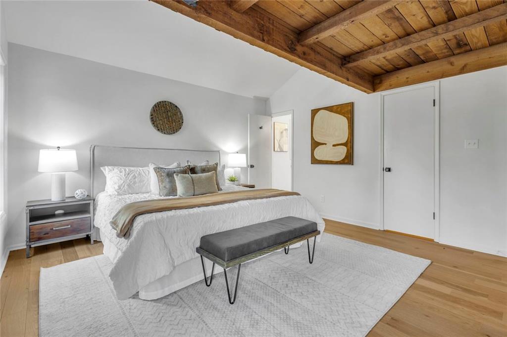 260 Devilla Trace Fayetteville, GA 30214 - Photo 22 of 47 a bedroom with a bed and a lamp