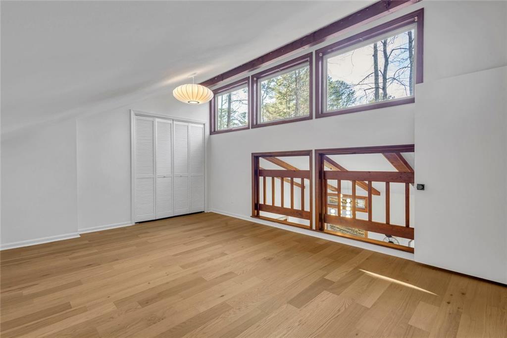 260 Devilla Trace Fayetteville, GA 30214 - Photo 28 of 47 wooden floor in an empty room with a window