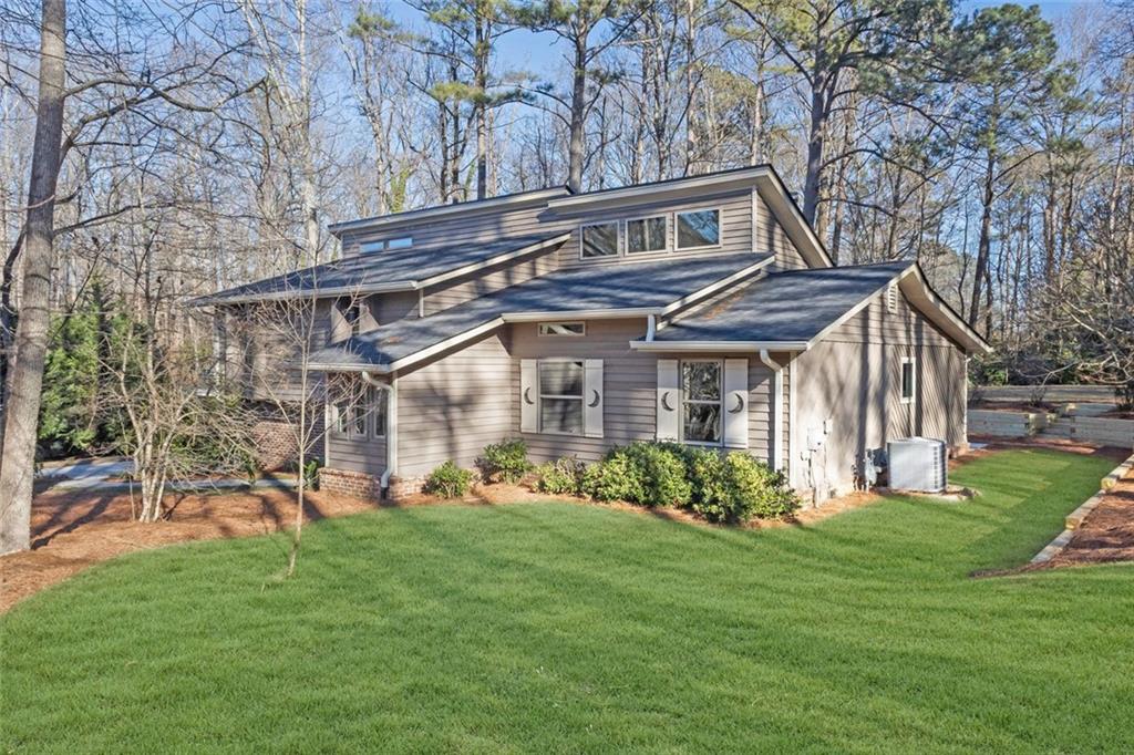 260 Devilla Trace Fayetteville, GA 30214 - Photo 4 of 47 a front view of a house with garden
