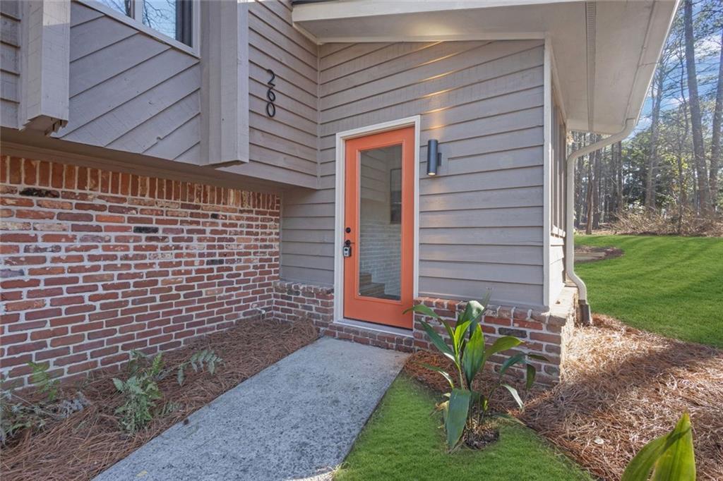 260 Devilla Trace Fayetteville, GA 30214 - Photo 5 of 47 a view of a chair and table in backyard of the house